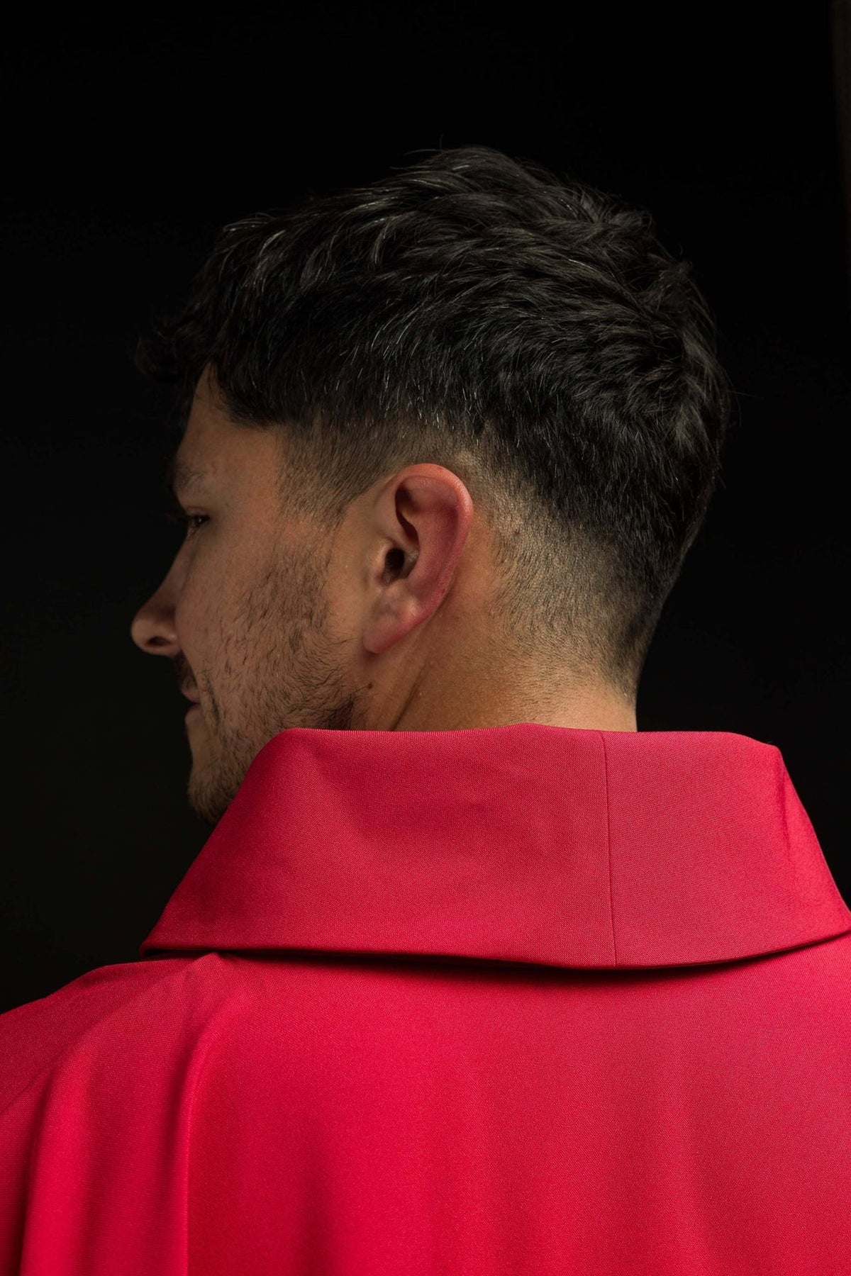 Red chasuble, close-up of red collar and satin fabric