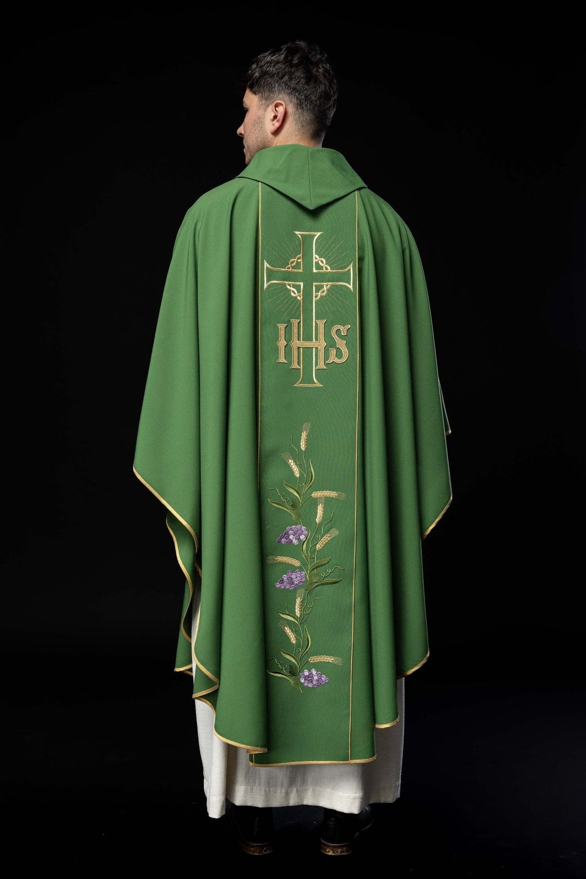 Green chasuble back view showing gold orphrey with cross, IHS, wheat and grapes