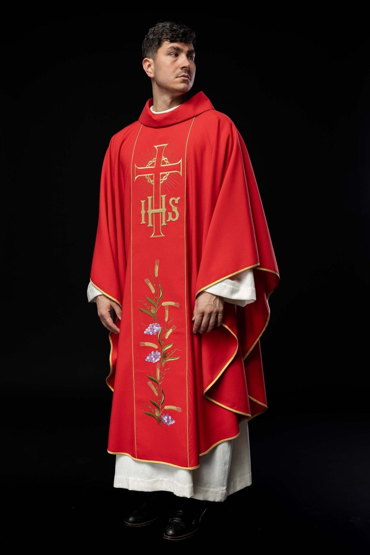 Red chasuble three-quarter front view with gold trim, wheat and grapes