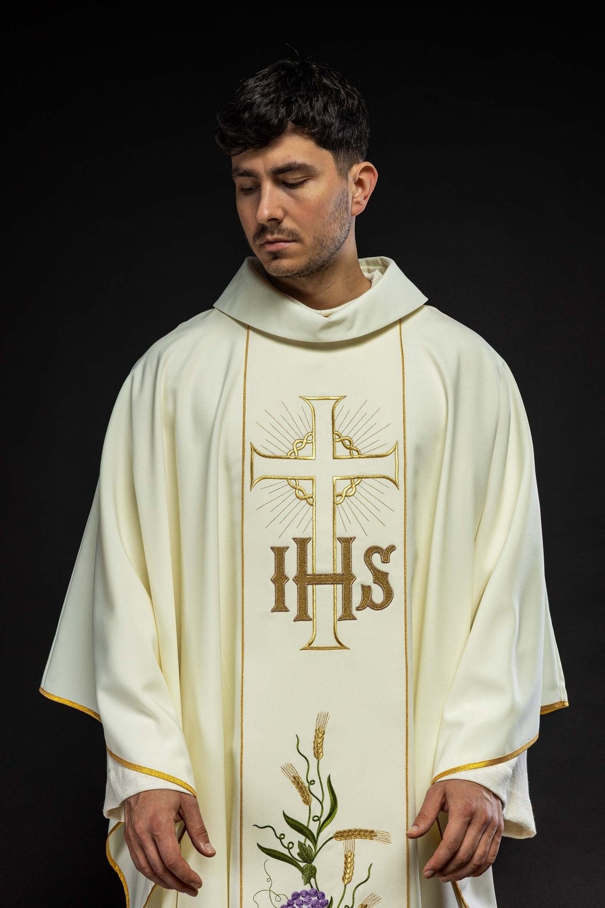 Ivory chasuble front close-up with embroidered gold cross, IHS and stand-up collar