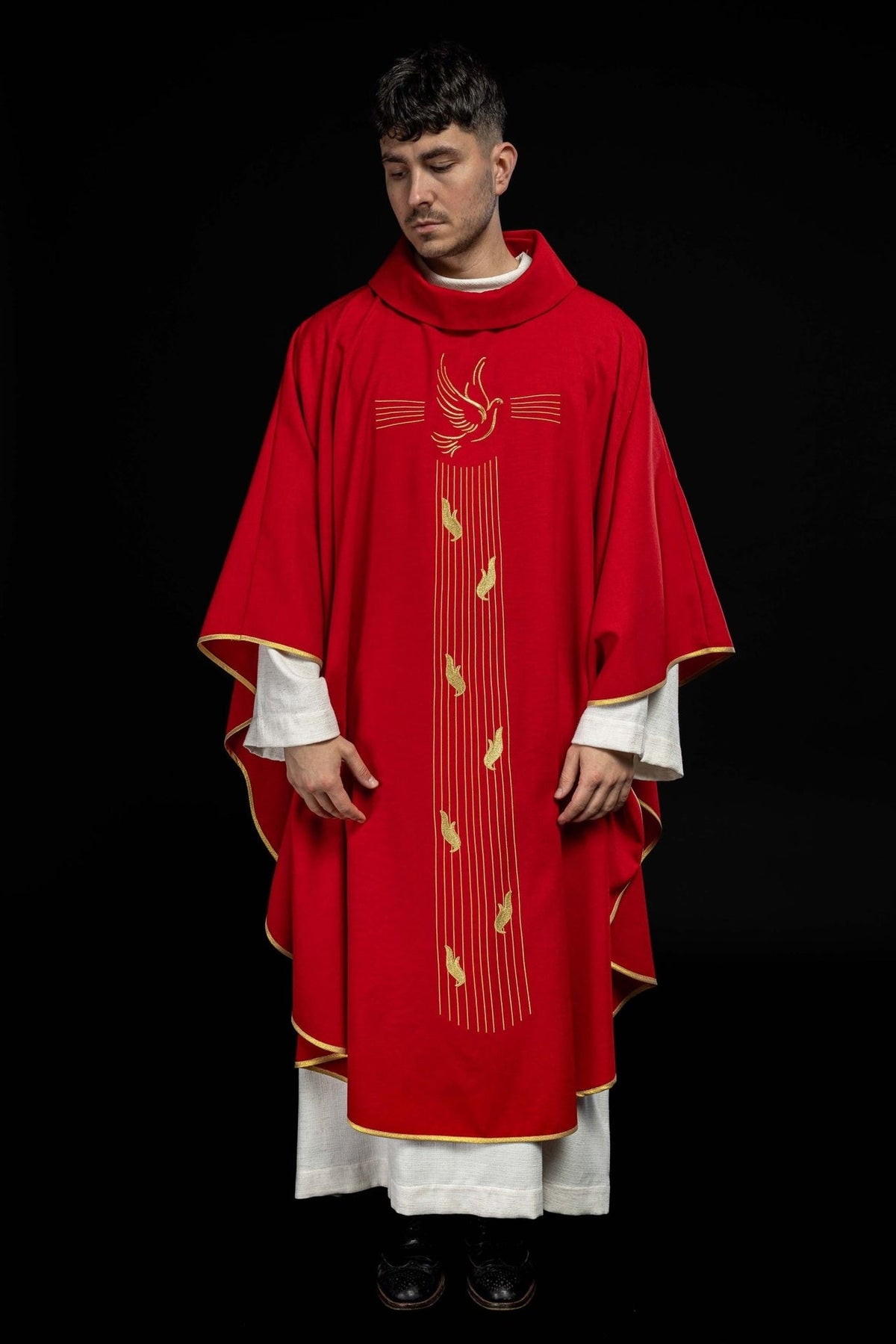 Red chasuble full front view with gold trim and Holy Spirit embroidery