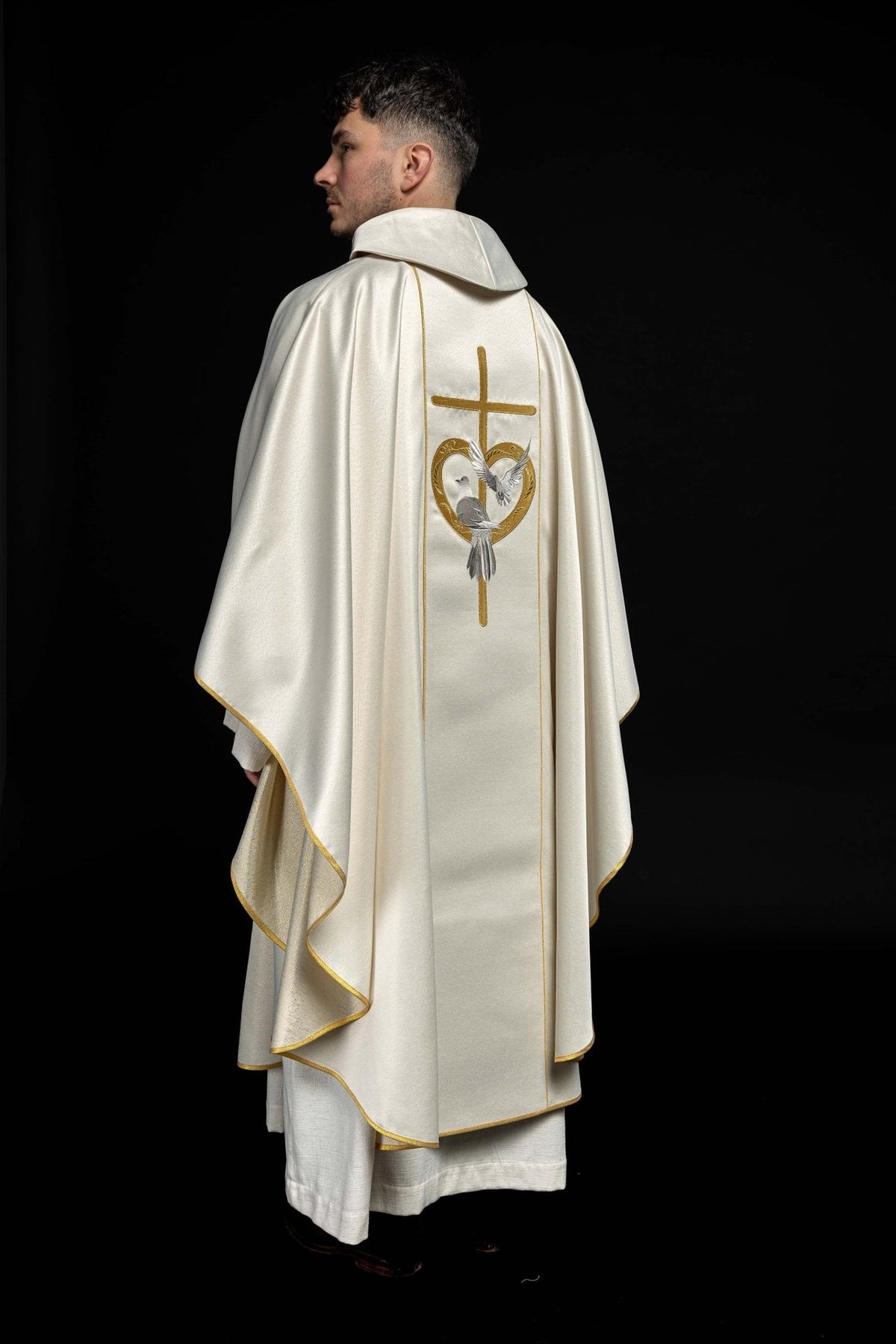 Wedding chasuble back three-quarter view with gold-edged sleeves