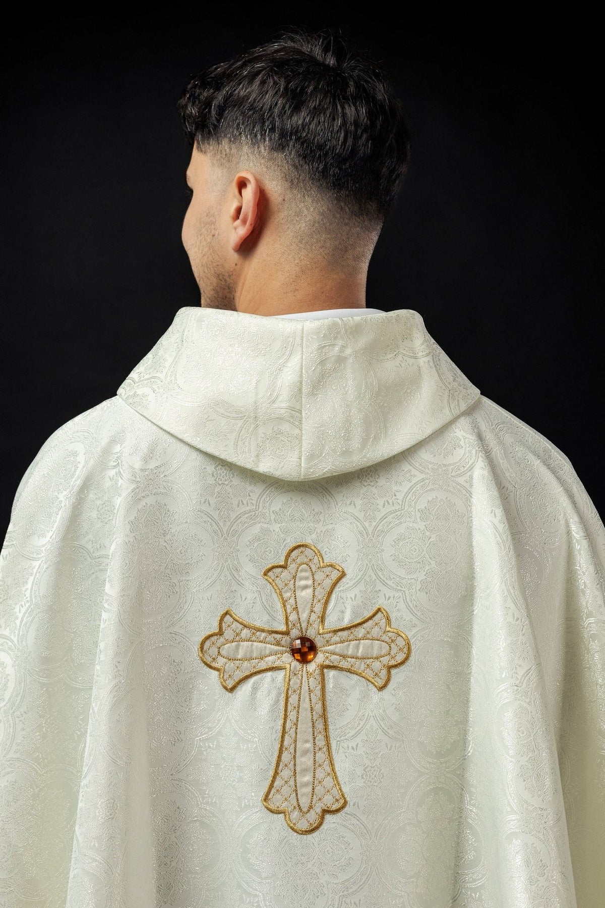 Ecru chasuble back view with embroidered gold cross and stand-up collar