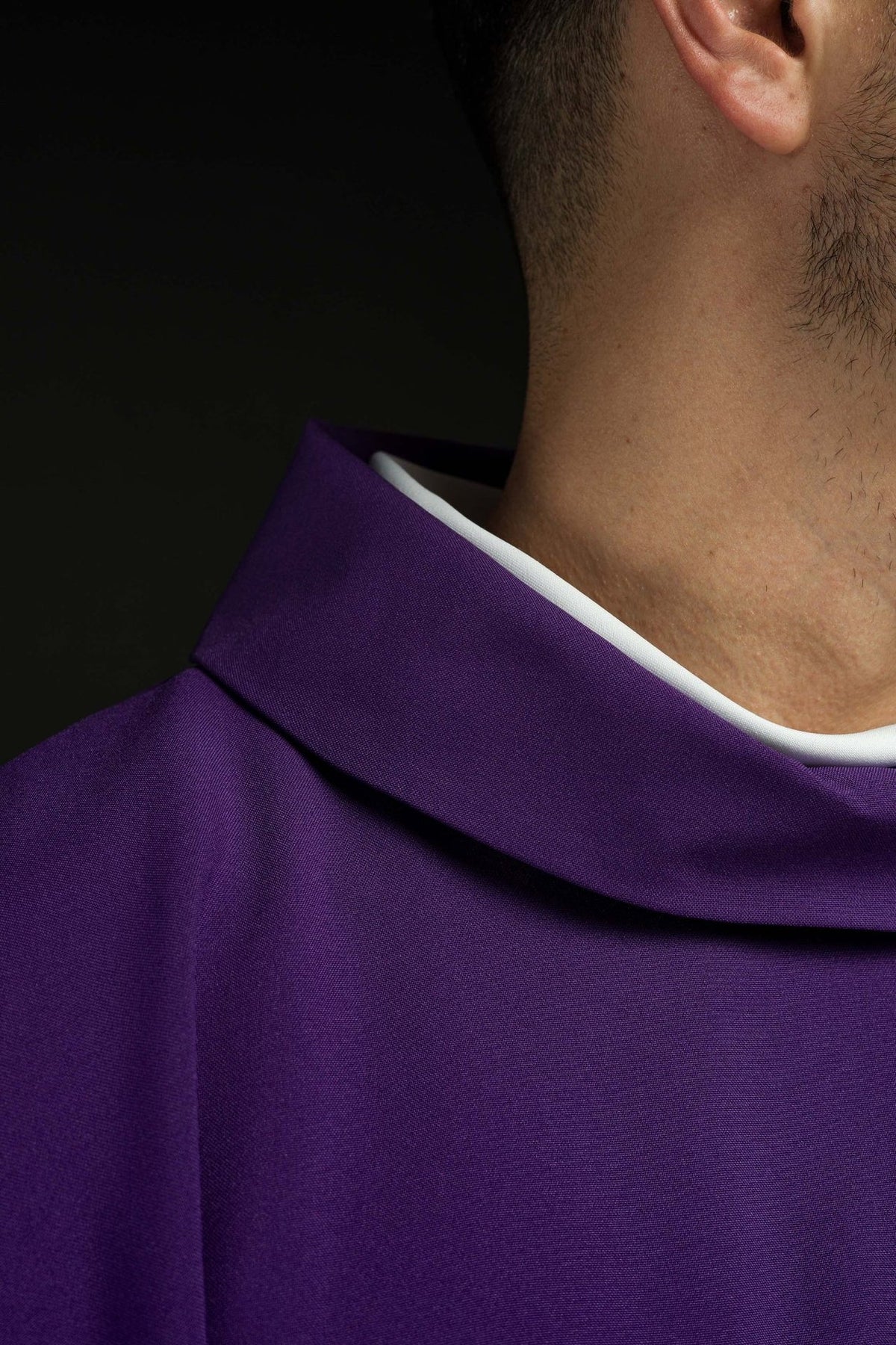 Purple chasuble close-up of stand-up collar and satin fabric
