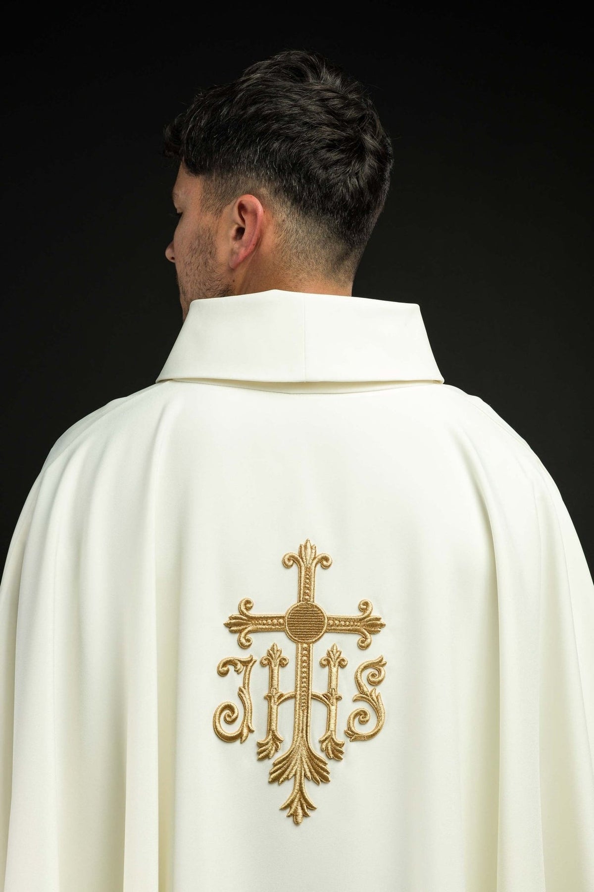 Ecru chasuble back view with gold embroidered cross and trim
