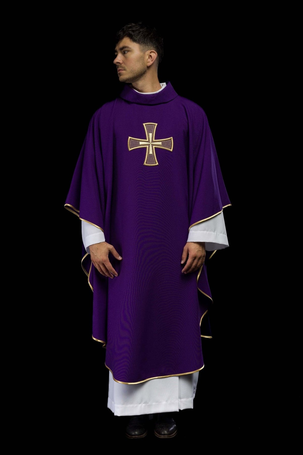 Purple chasuble worn front view with gold embroidered cross and trim