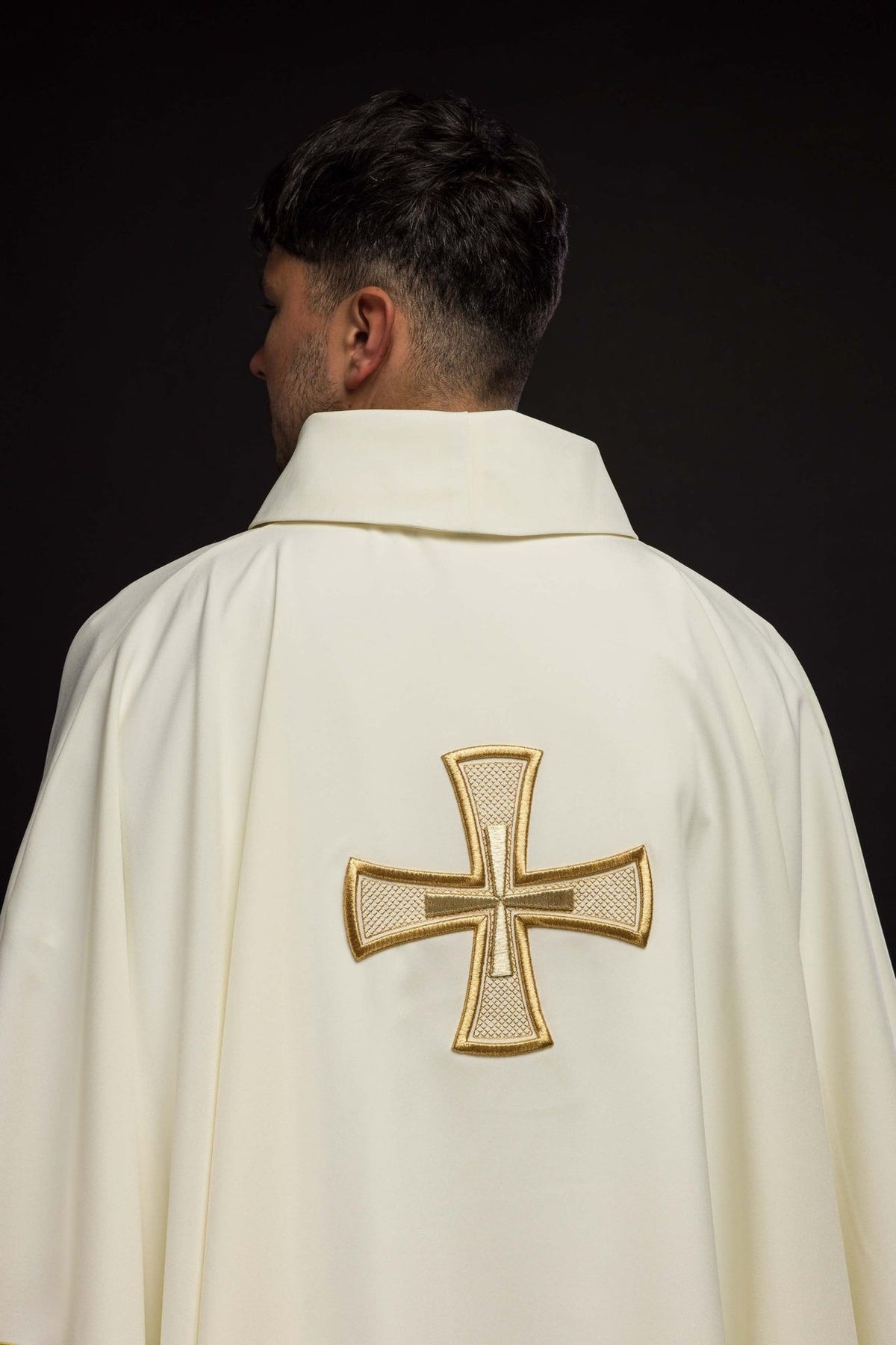 Ecru chasuble back view with gold embroidered cross
