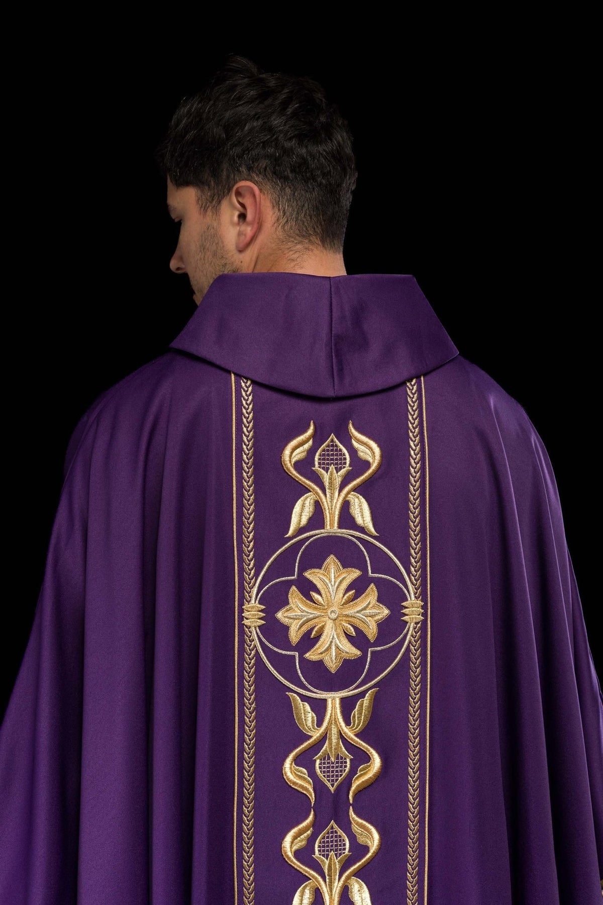 Purple chasuble back view with full gold embroidered orphrey and stand-up collar
