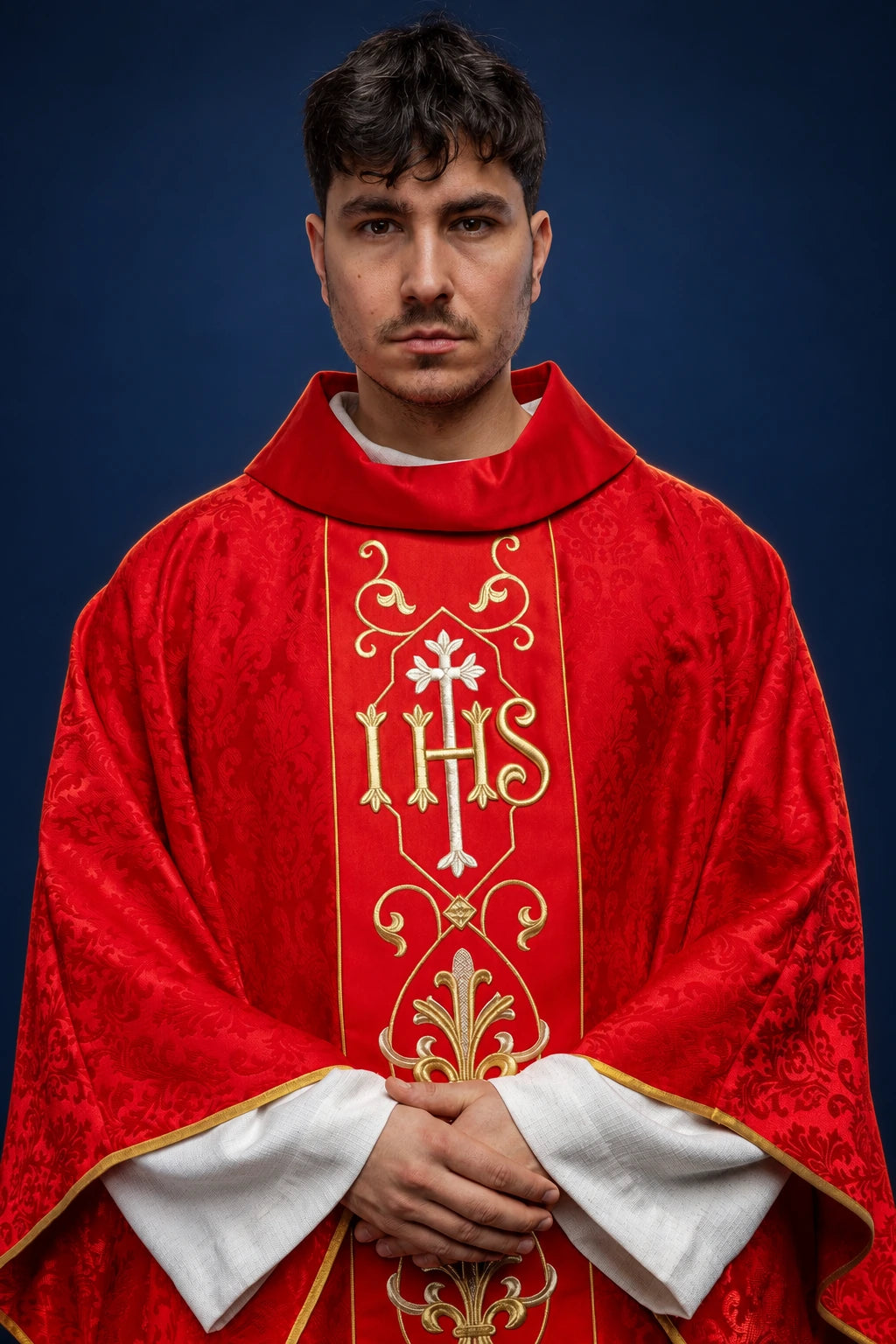 Red Embroidered Chasuble with Embellished Fabric and IHS, front view with gold embroidery and trim