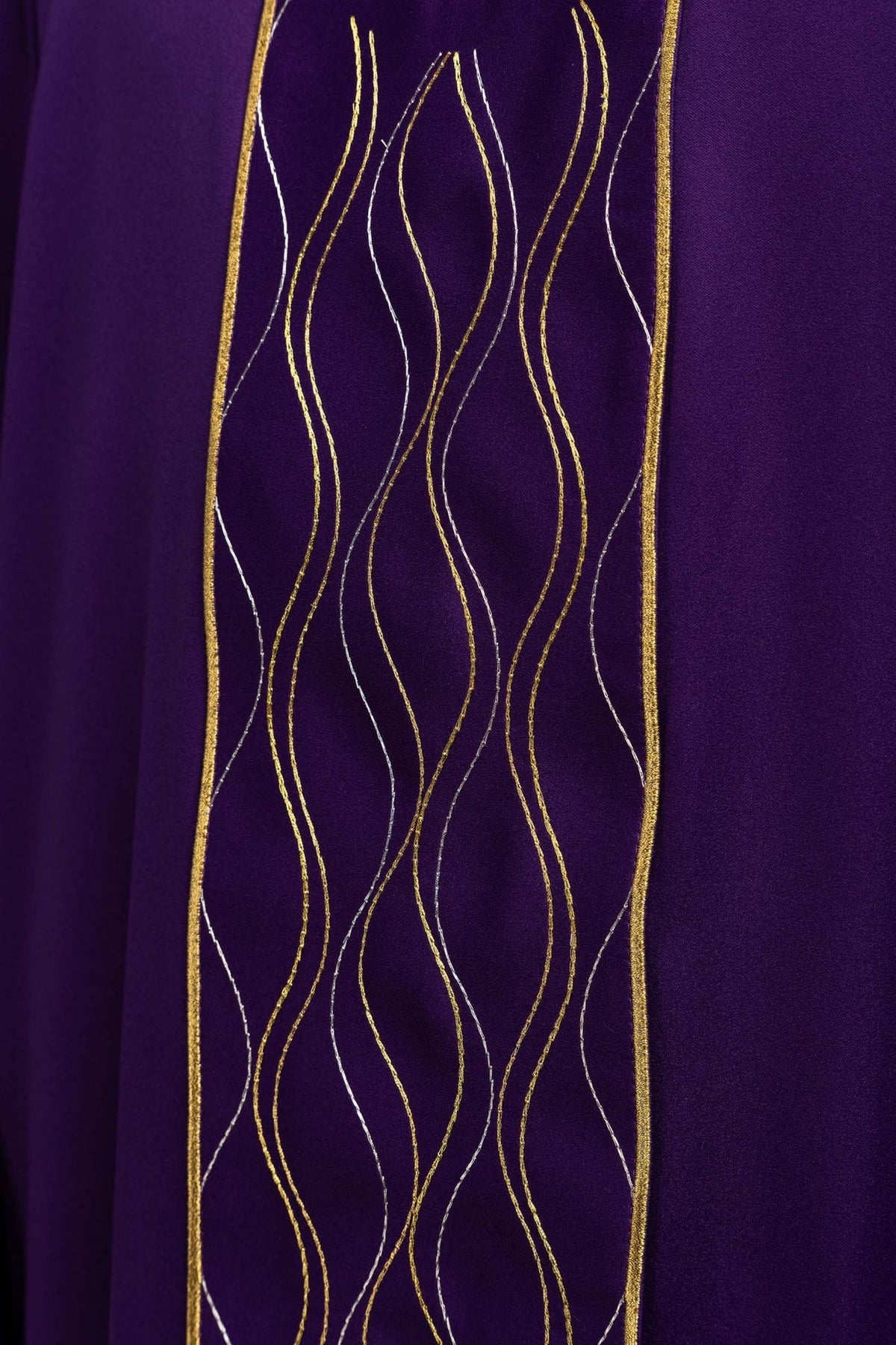 Purple chasuble close-up of gold and silver embroidered wavy orphrey