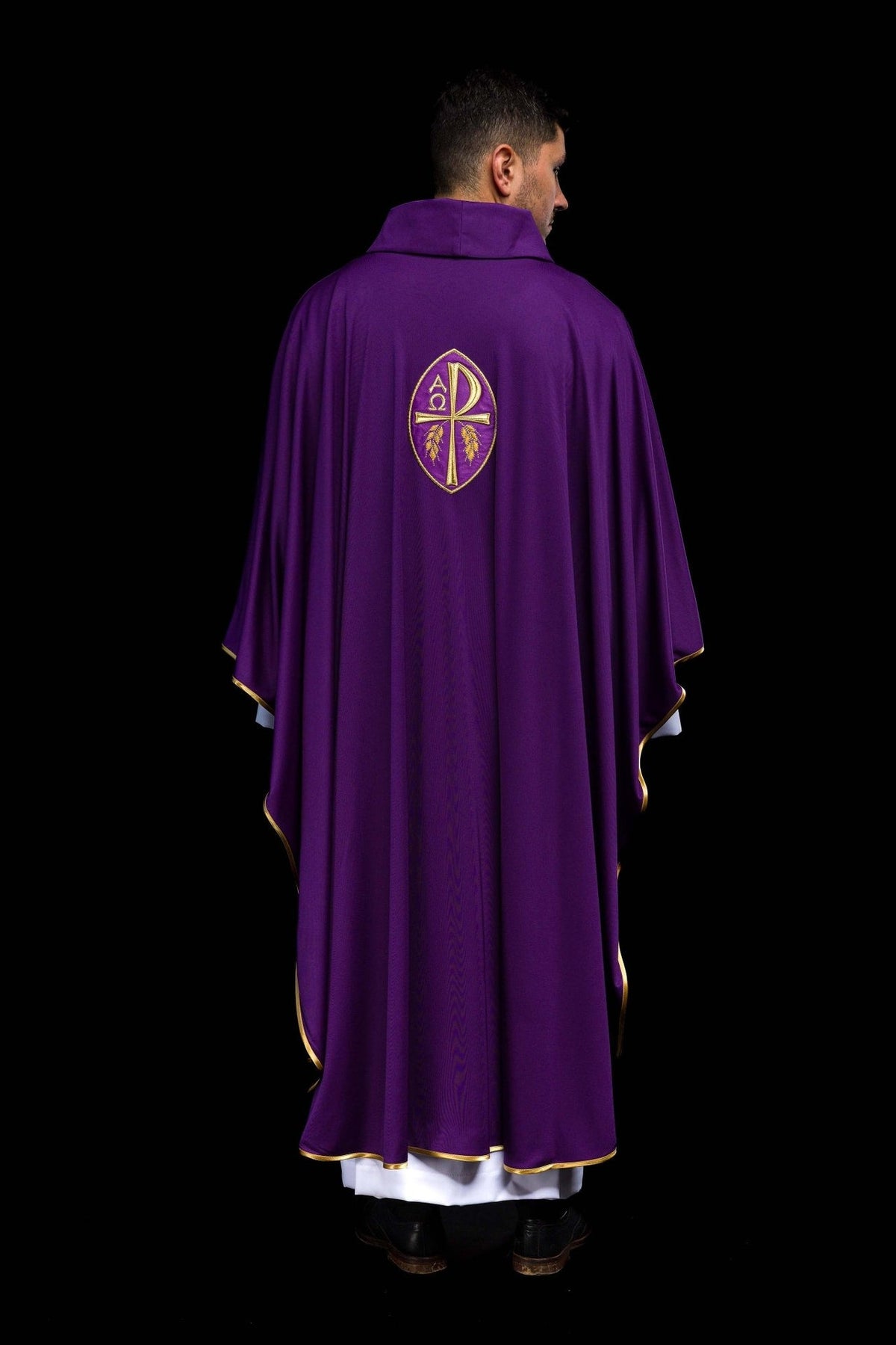 Purple embroidered chasuble, back view with gold cross embroidery and trim