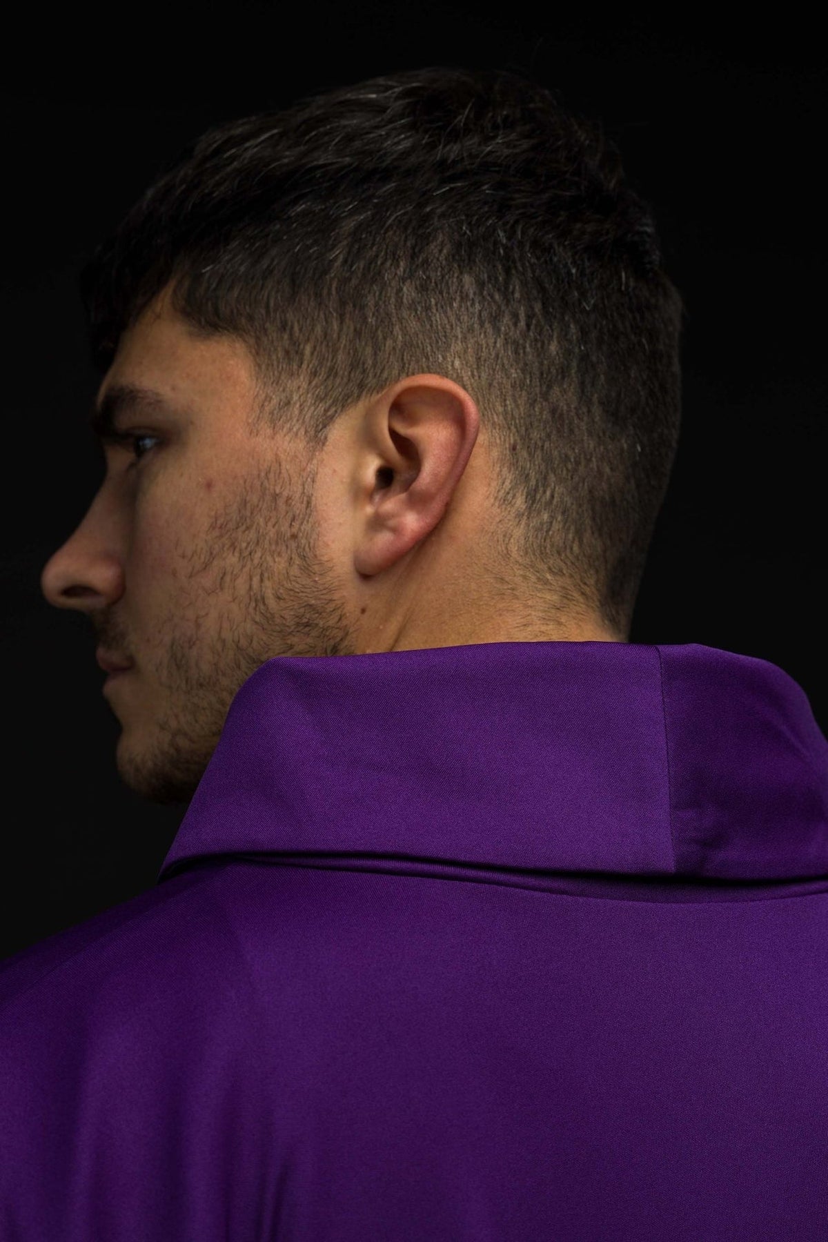 Purple chasuble side view showing stand-up collar