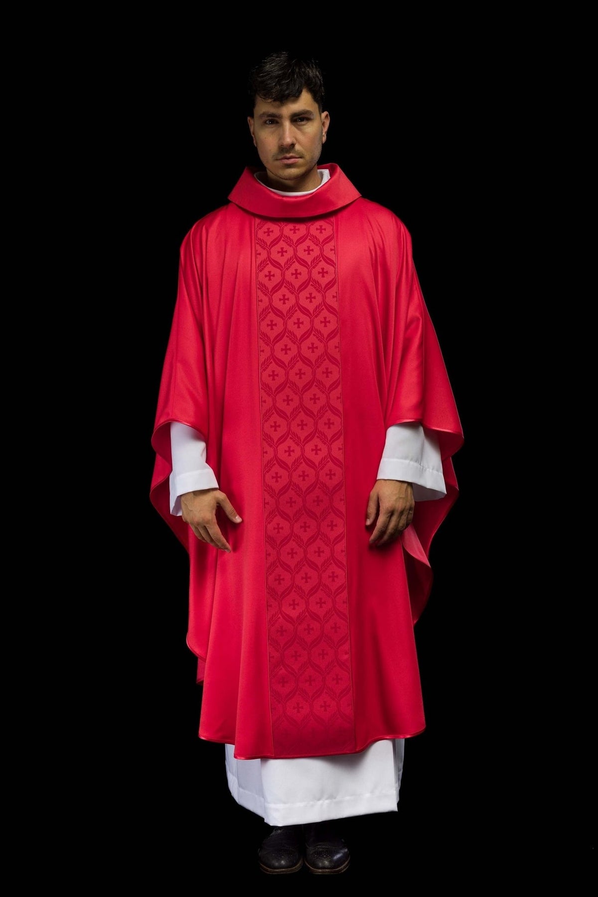 Red chasuble front view with jacquard orphrey and crosses