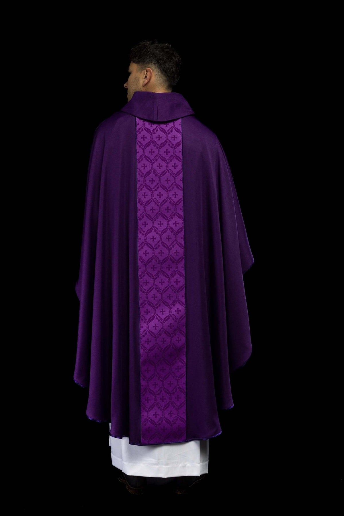 Purple chasuble back view with jacquard orphrey and stand-up collar