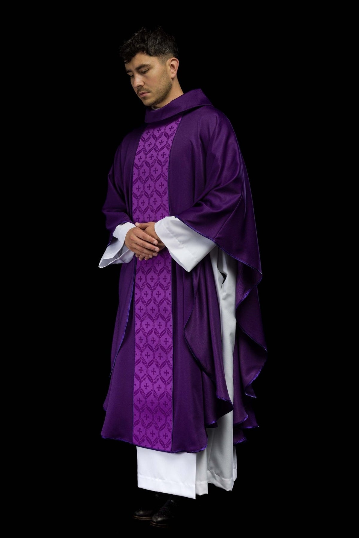 Purple chasuble three-quarter view with flowing satin trim