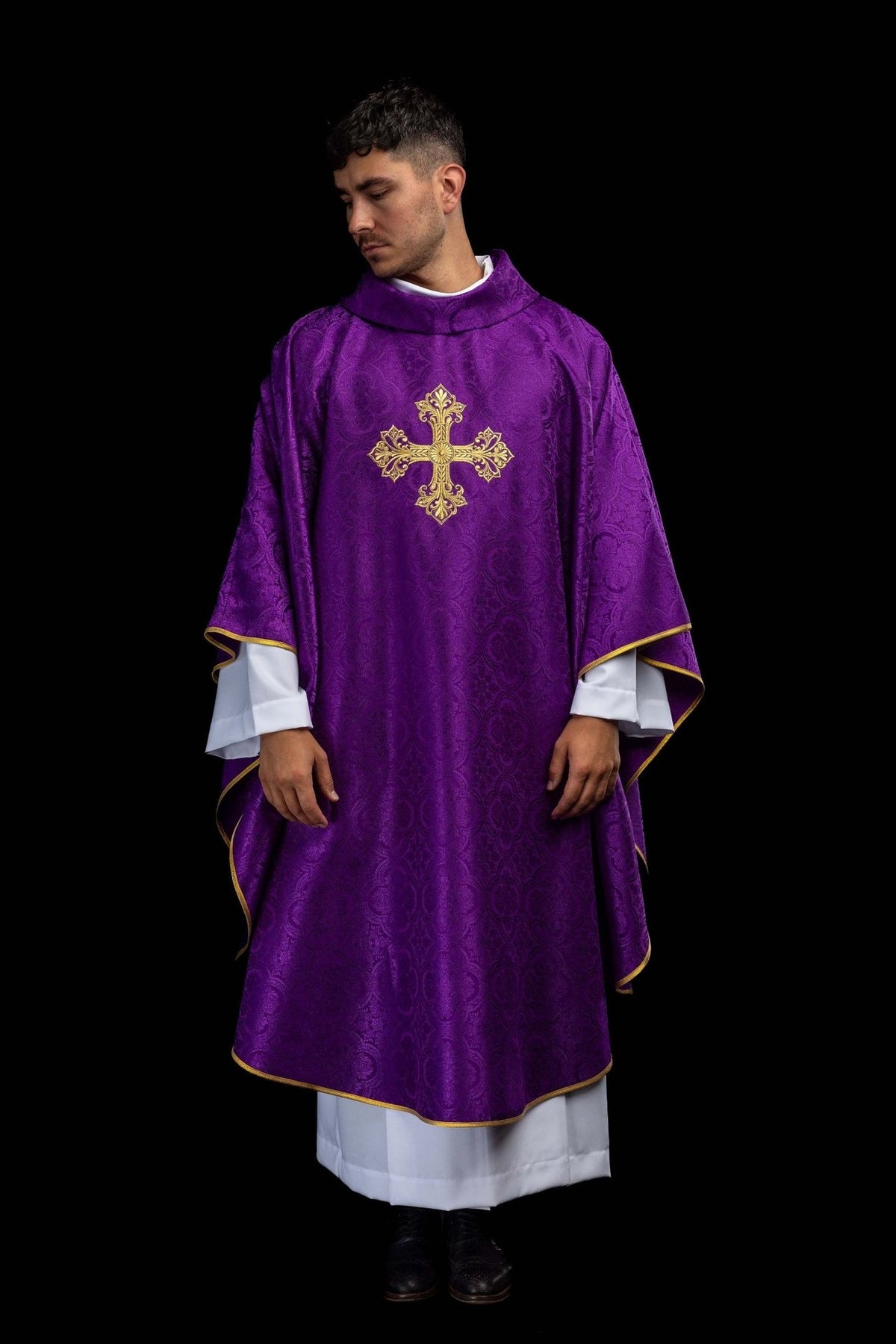 Purple chasuble worn full front view with gold cross embroidery and gold trim