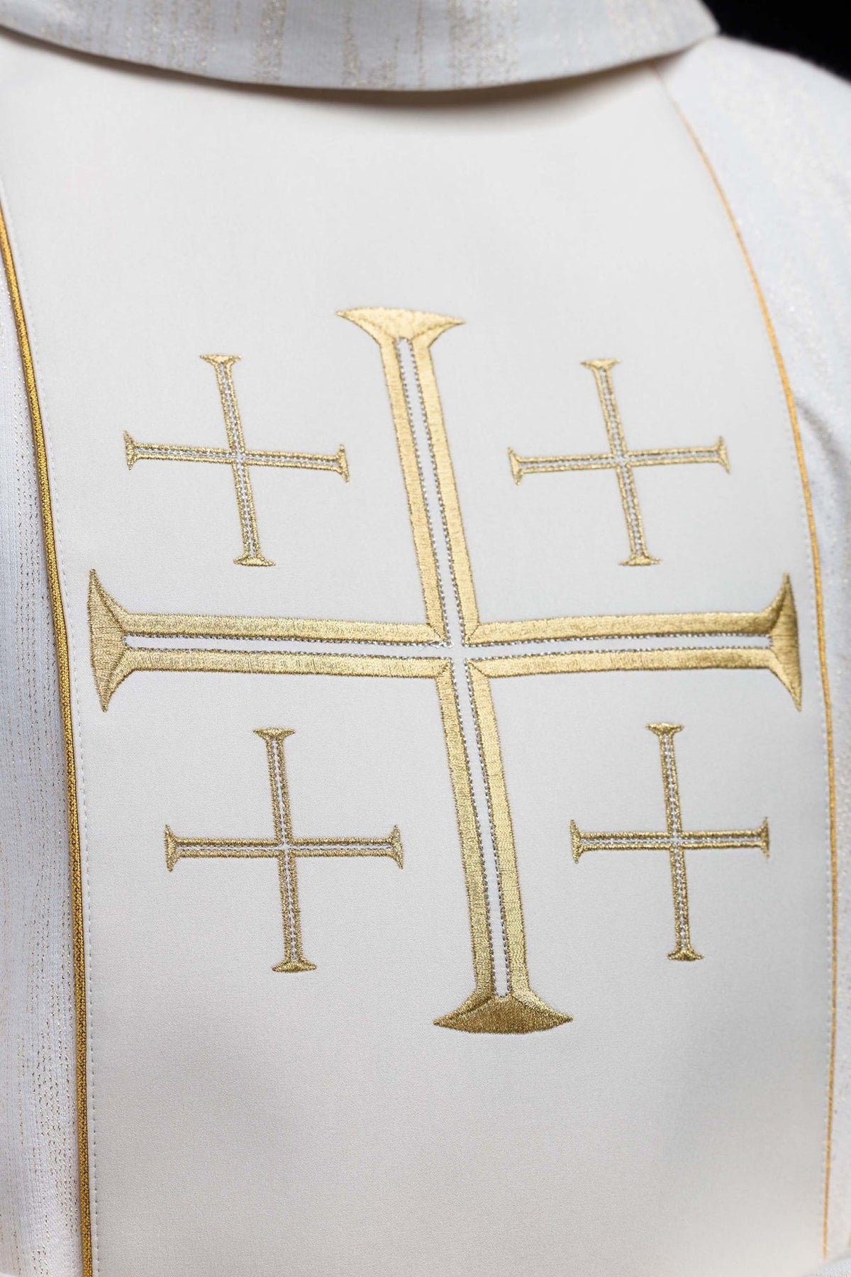 Chasuble orphrey close-up showing gold Jerusalem cross embroidery