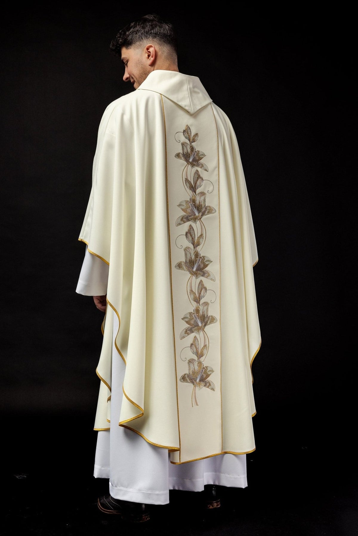 Ecru Saint Anthony chasuble rear three-quarter view with embroidered floral orphrey