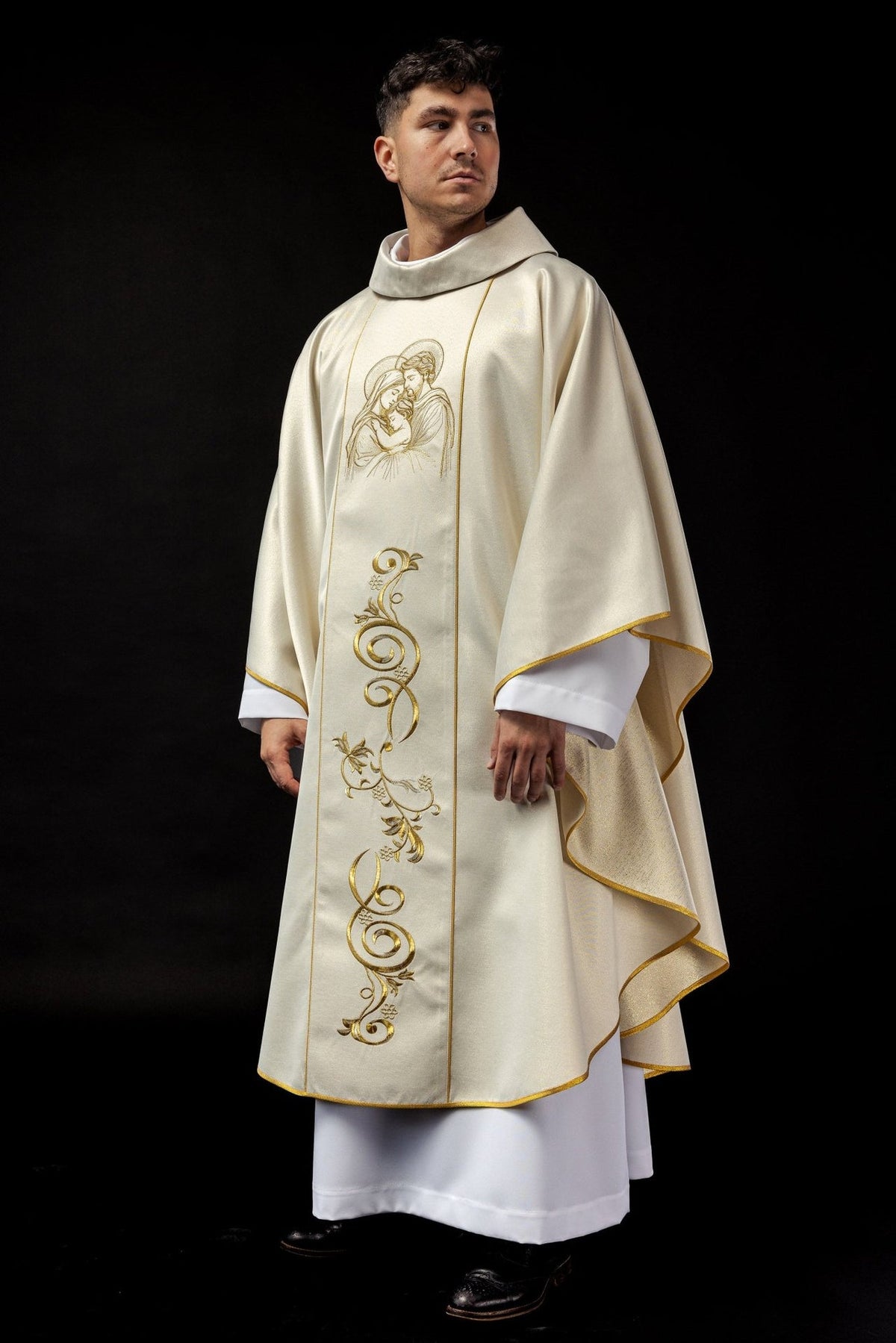Christmas Catholic chasuble, three-quarter front view with Holy Family embroidery and gold trim