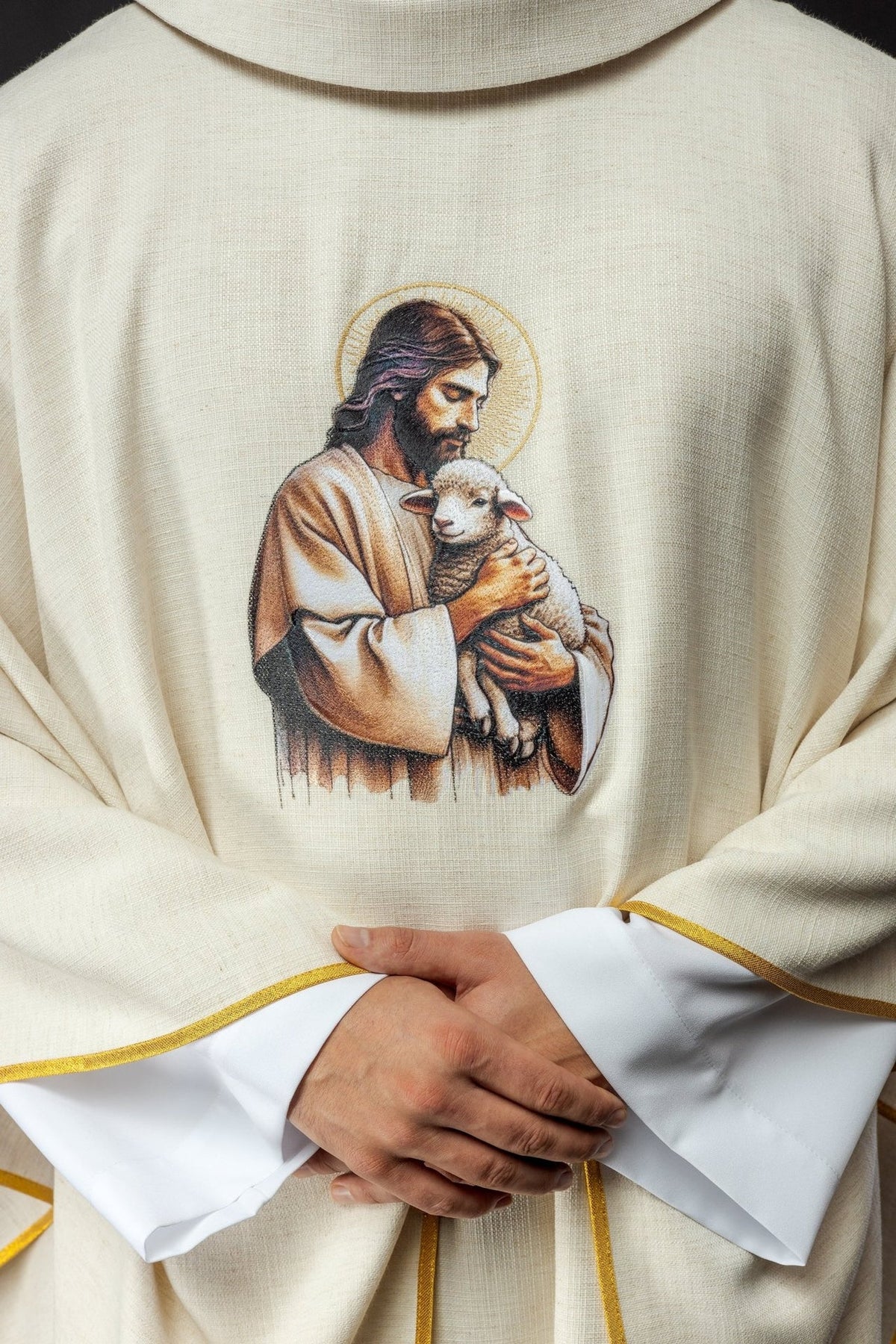 Ecru chasuble close-up of Good Shepherd and lamb embroidery