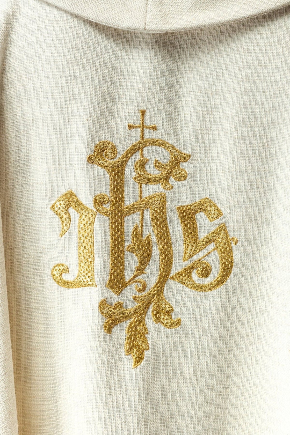 Saint Francis chasuble back view with gold embroidered IHS emblem