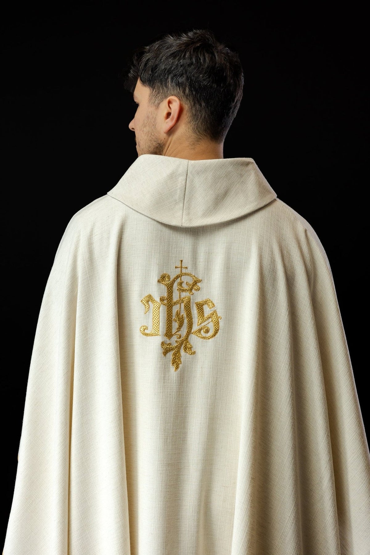 Ecru chasuble sleeve detail with gold trim