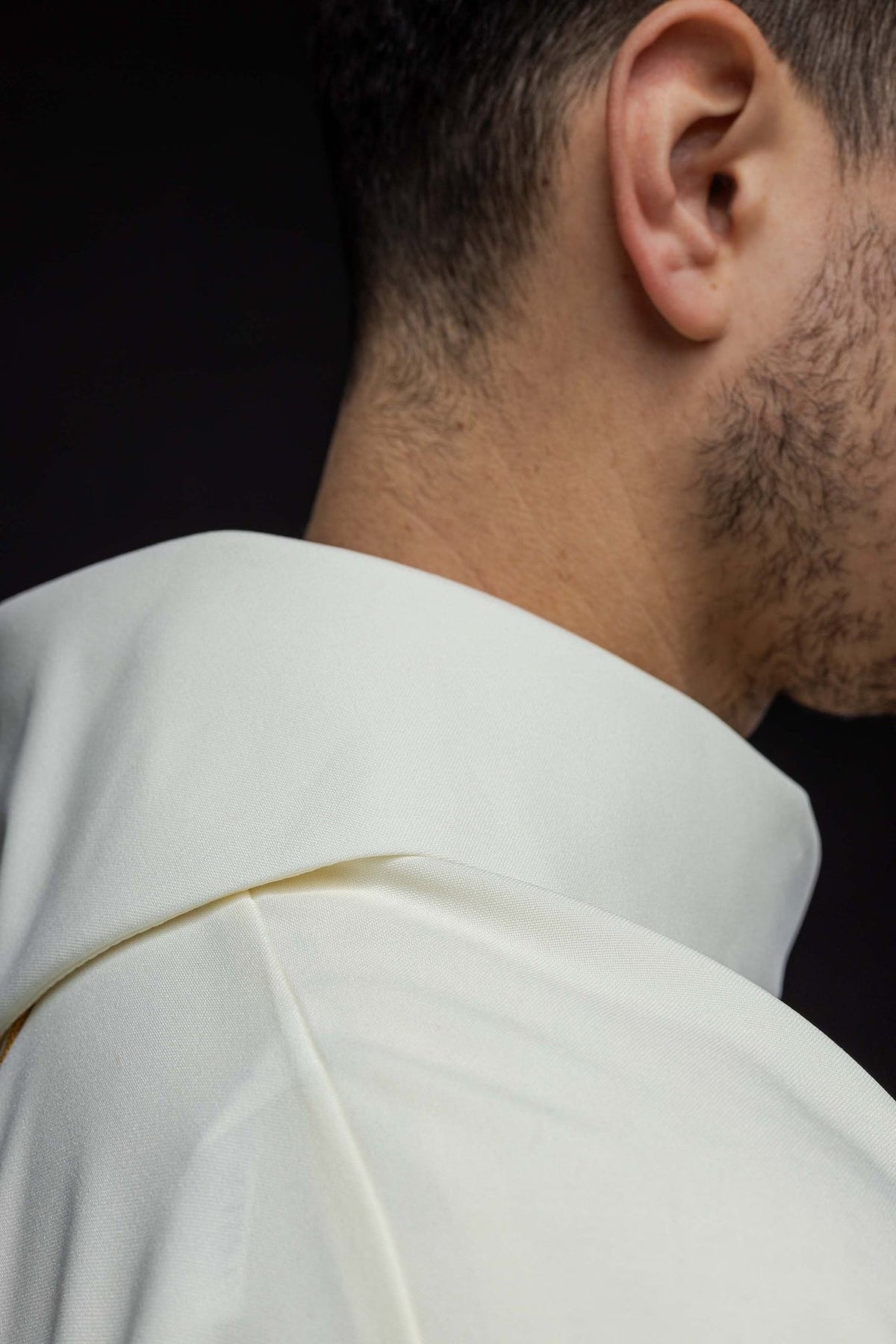 Holy Trinity chasuble shoulder detail showing white fabric and layered construction