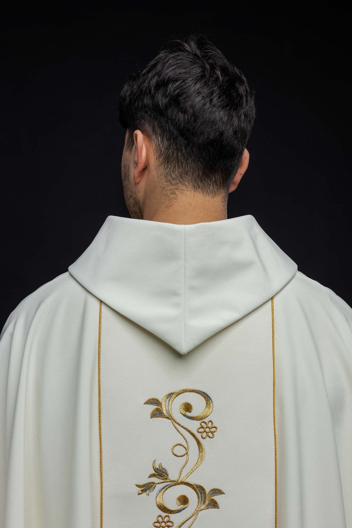 Holy Trinity chasuble back view showing white stand-up collar and gold scrollwork