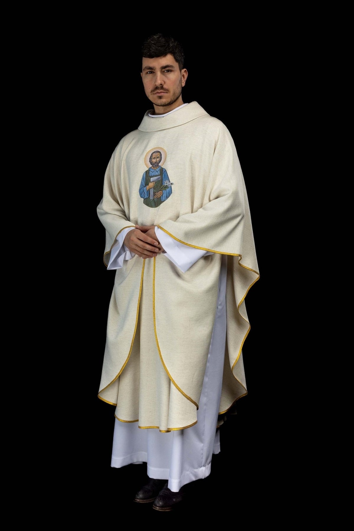 Saint Joseph the Worker chasuble, angled front view with embroidered figure and gold trim