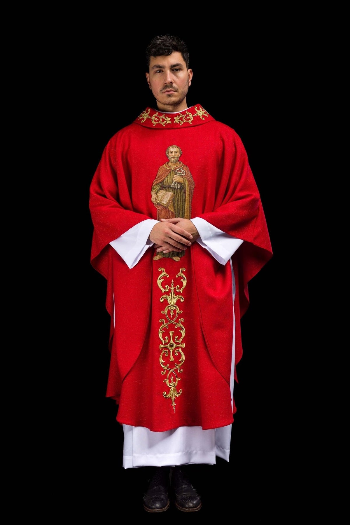 Red chasuble front view worn with Saint Peter embroidery and gold orphrey