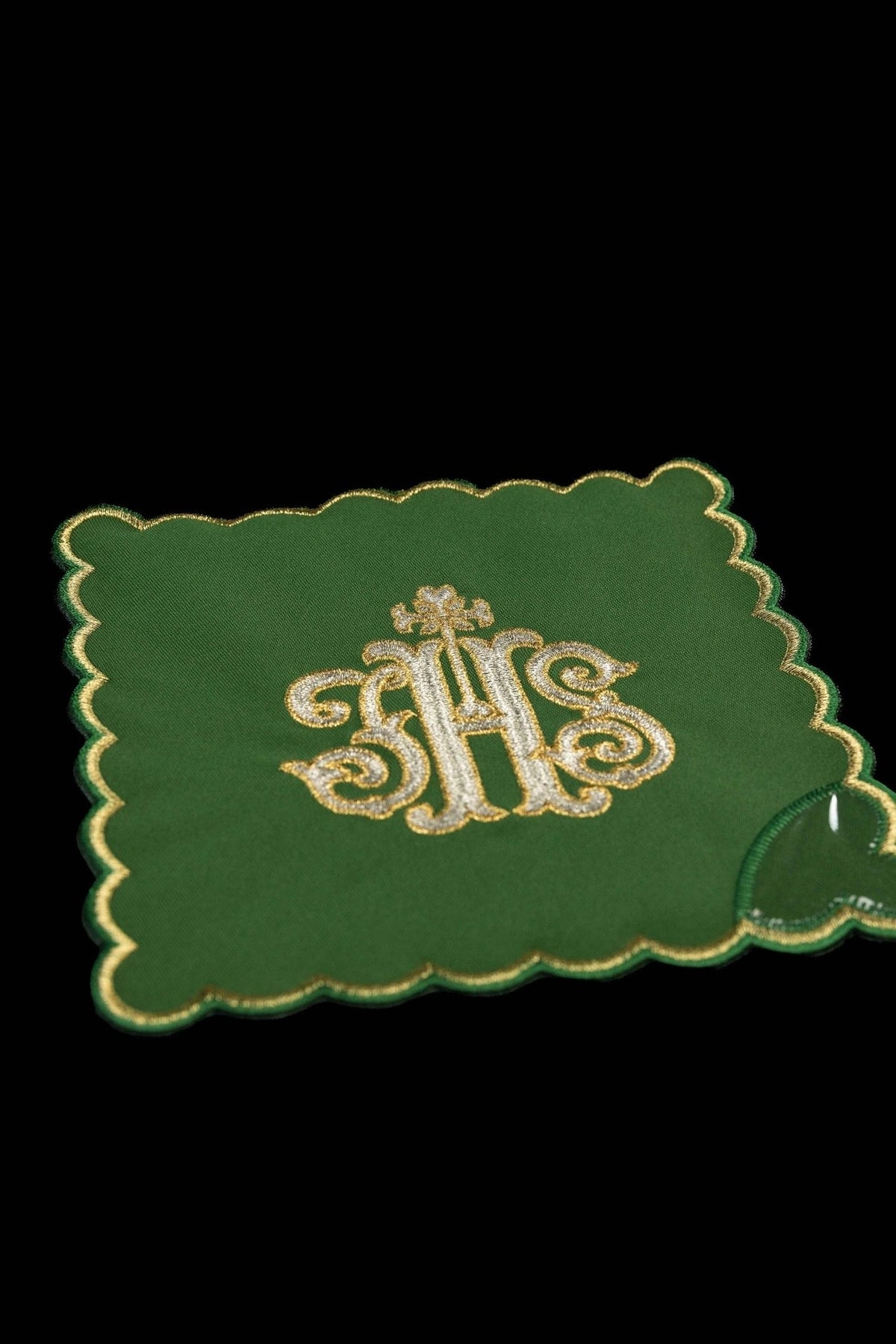 Green chalice pall with embroidered IHS monogram and gold scalloped border
