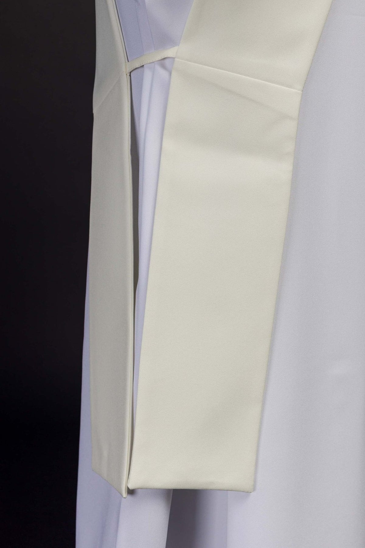 IHS deacon stole back view showing the plain ivory reverse and gold monogram