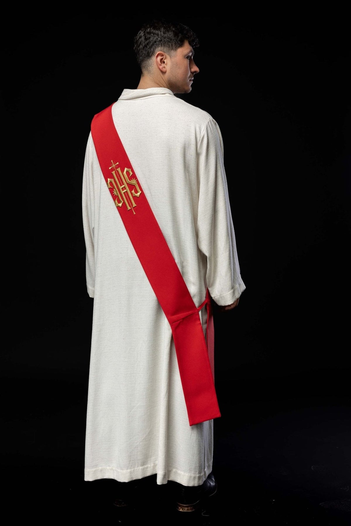 Red deacon stole worn in a back view with plain lower panel