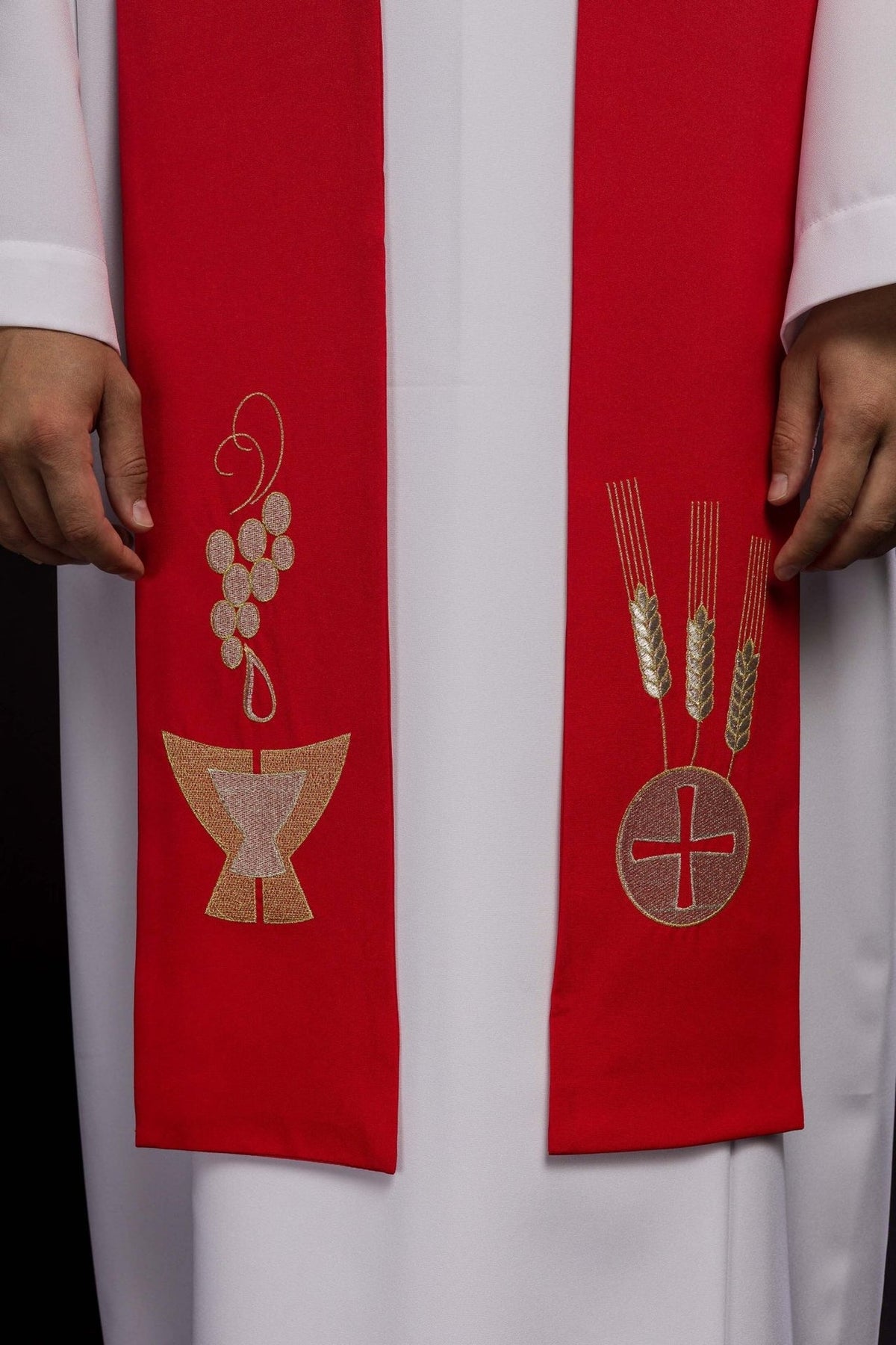 Red priest stole close-up with chalice, wheat and grapes embroidery
