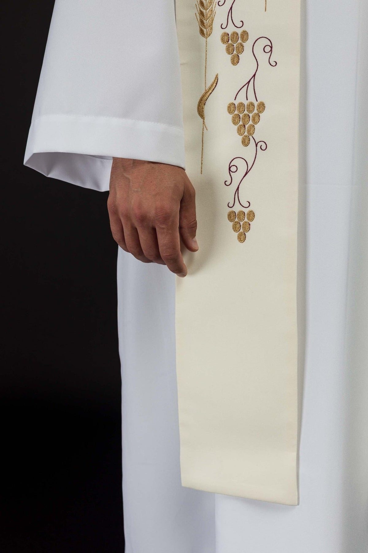Ecru priest stole close-up showing lower grape and vine embroidery
