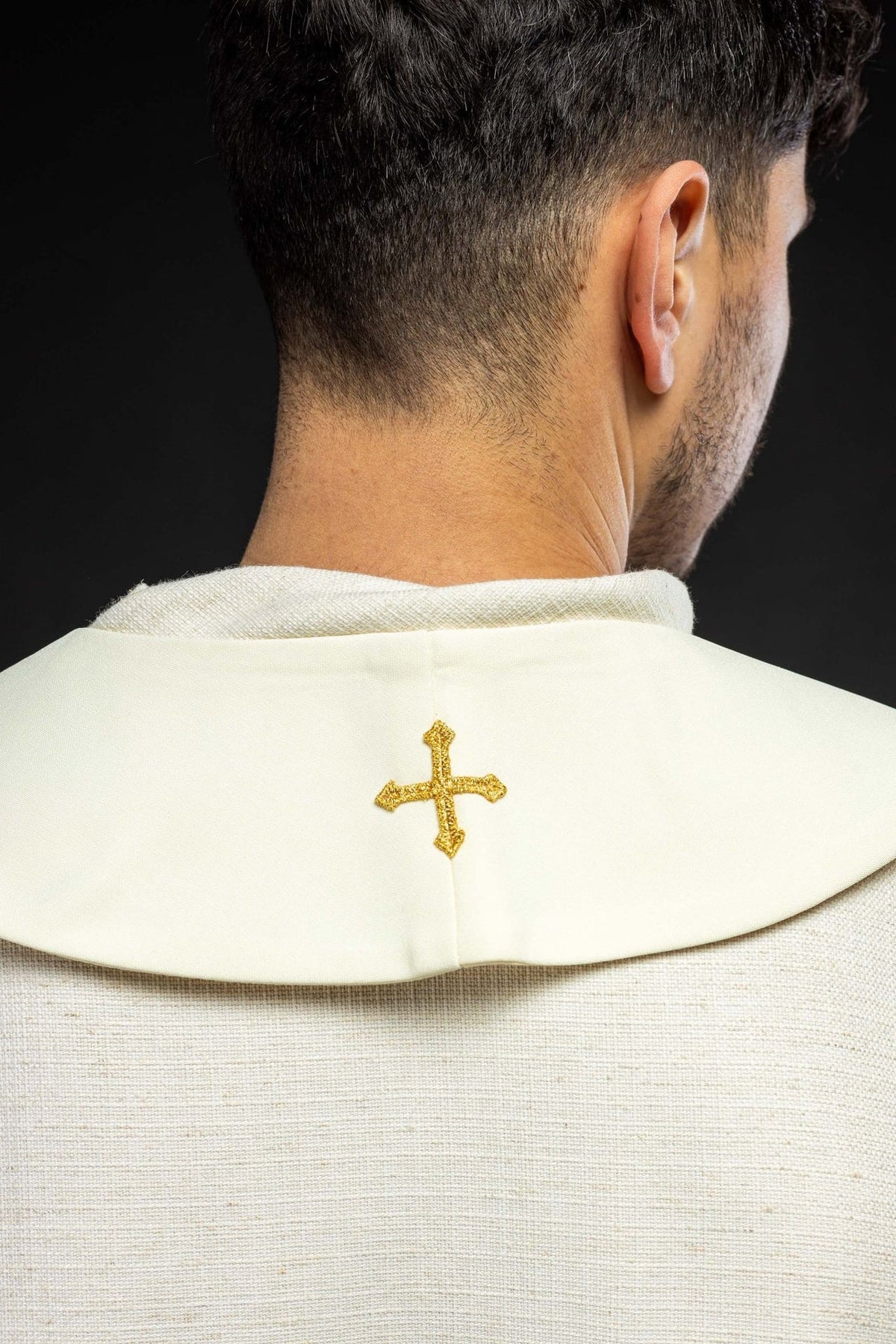 Ecru stole back view showing a small embroidered gold cross