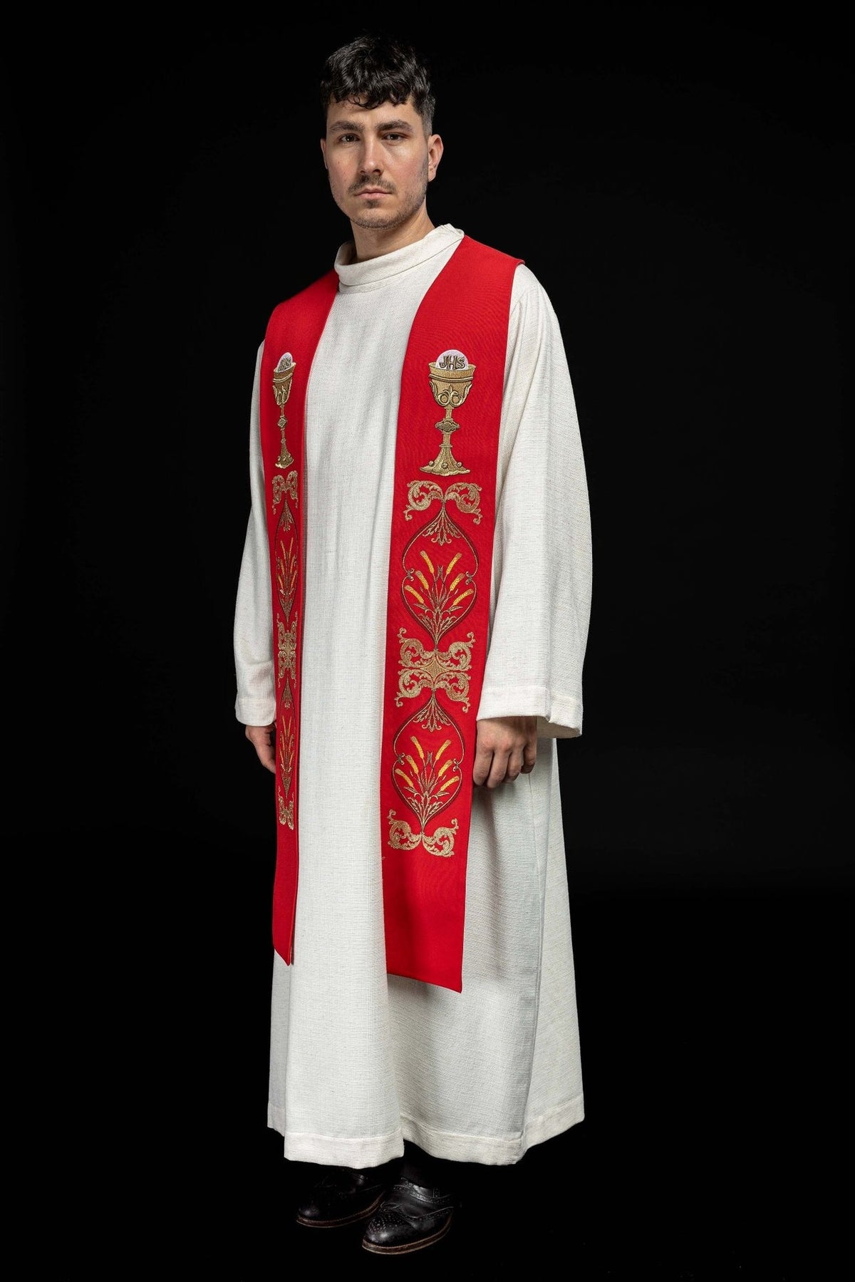 Red priest stole worn, full front view with chalice embroidery