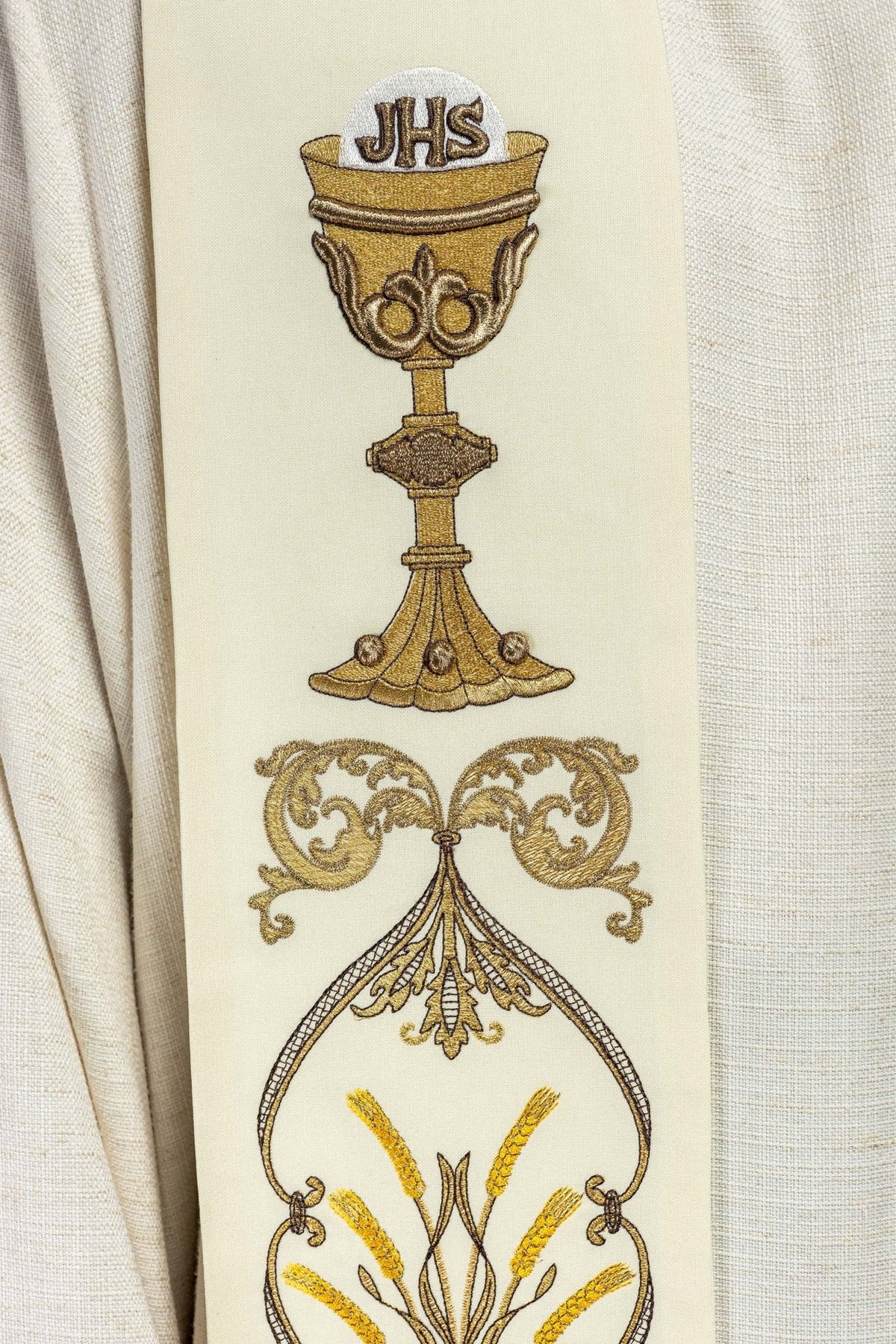 Ecru priest stole detail with gold chalice, scrollwork and wheat embroidery