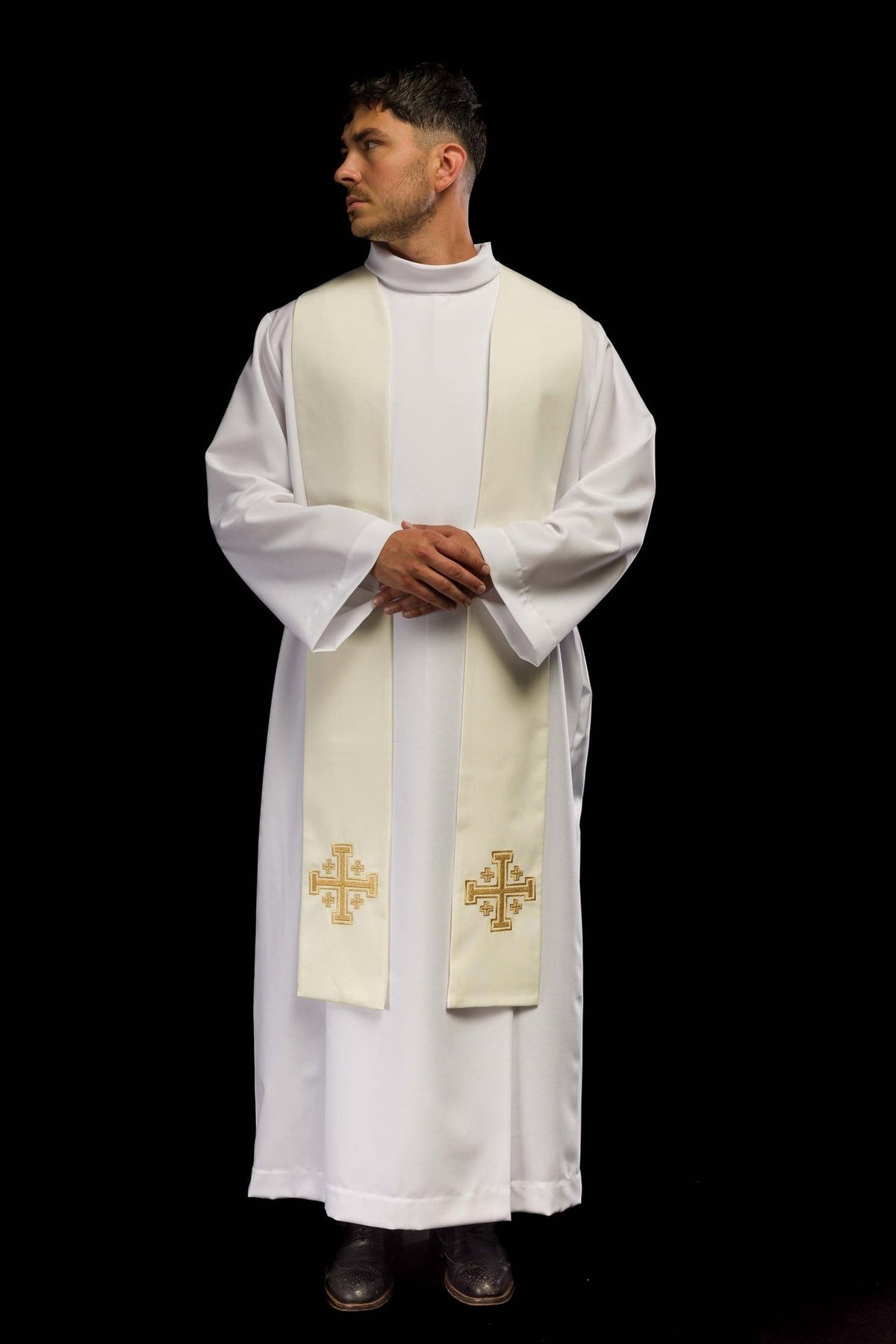 Ecru priest stole worn from the front, showing embroidered Jerusalem crosses