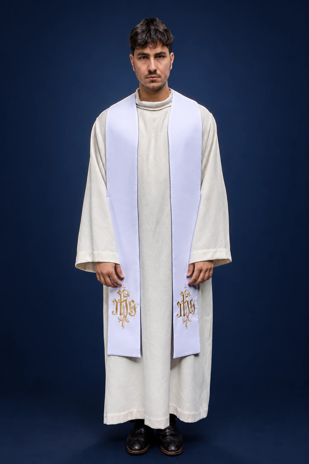 White Embroidered IHS Stole worn from the front, with gold IHS embroidery on both ends