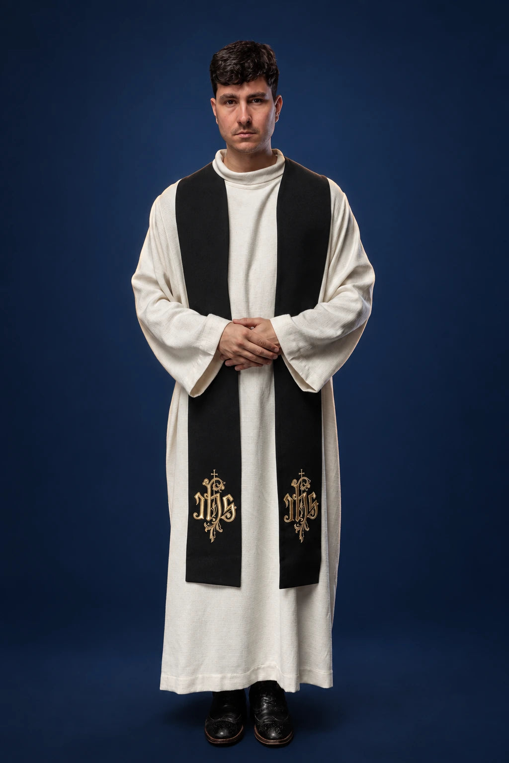 Embroidered IHS Stole with Gift Box worn front-facing in black with gold IHS embroidery