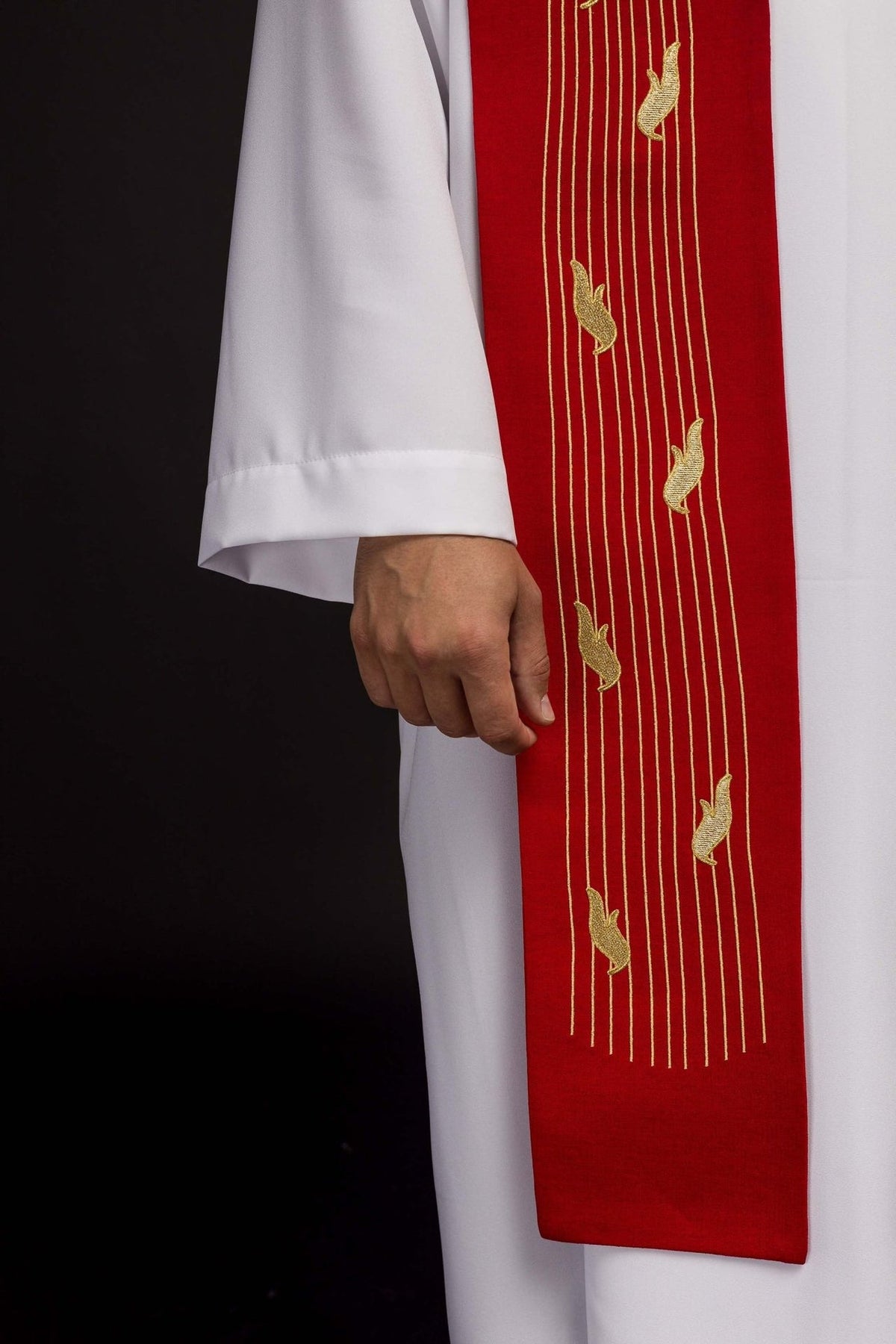 Red stole side close-up with embroidered gold feather motifs and vertical lines