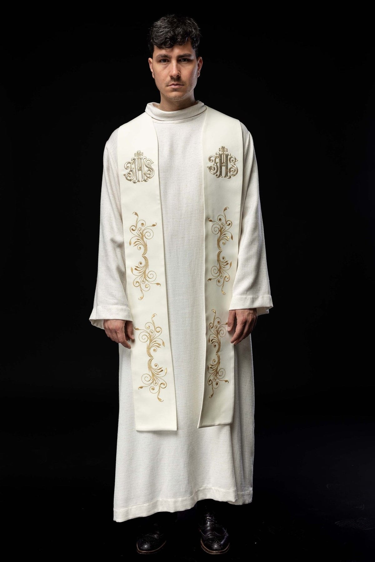 Ecru stole worn full front view with gold IHS and scroll embroidery