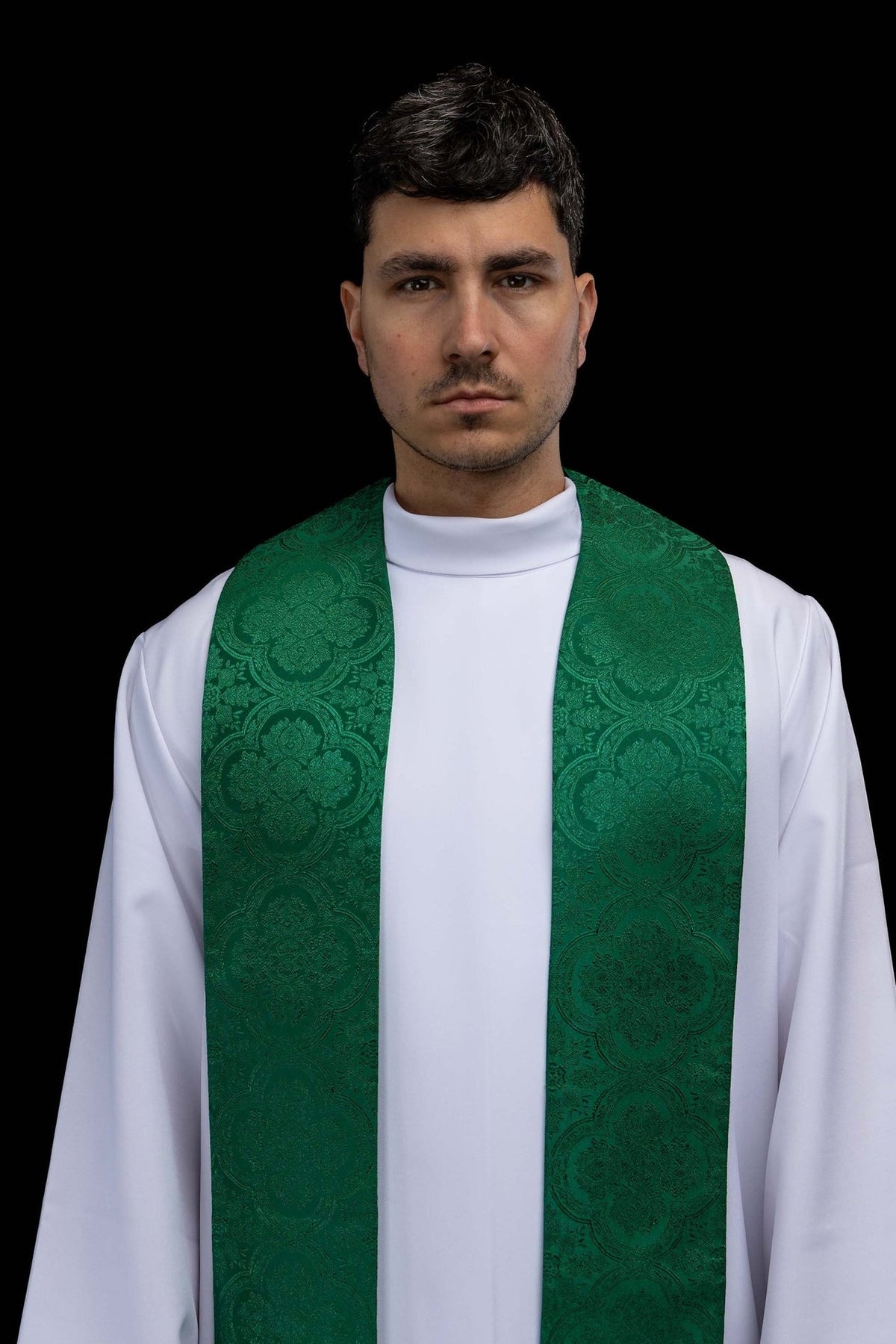 Green priest stole front close-up showing jacquard floral motifs