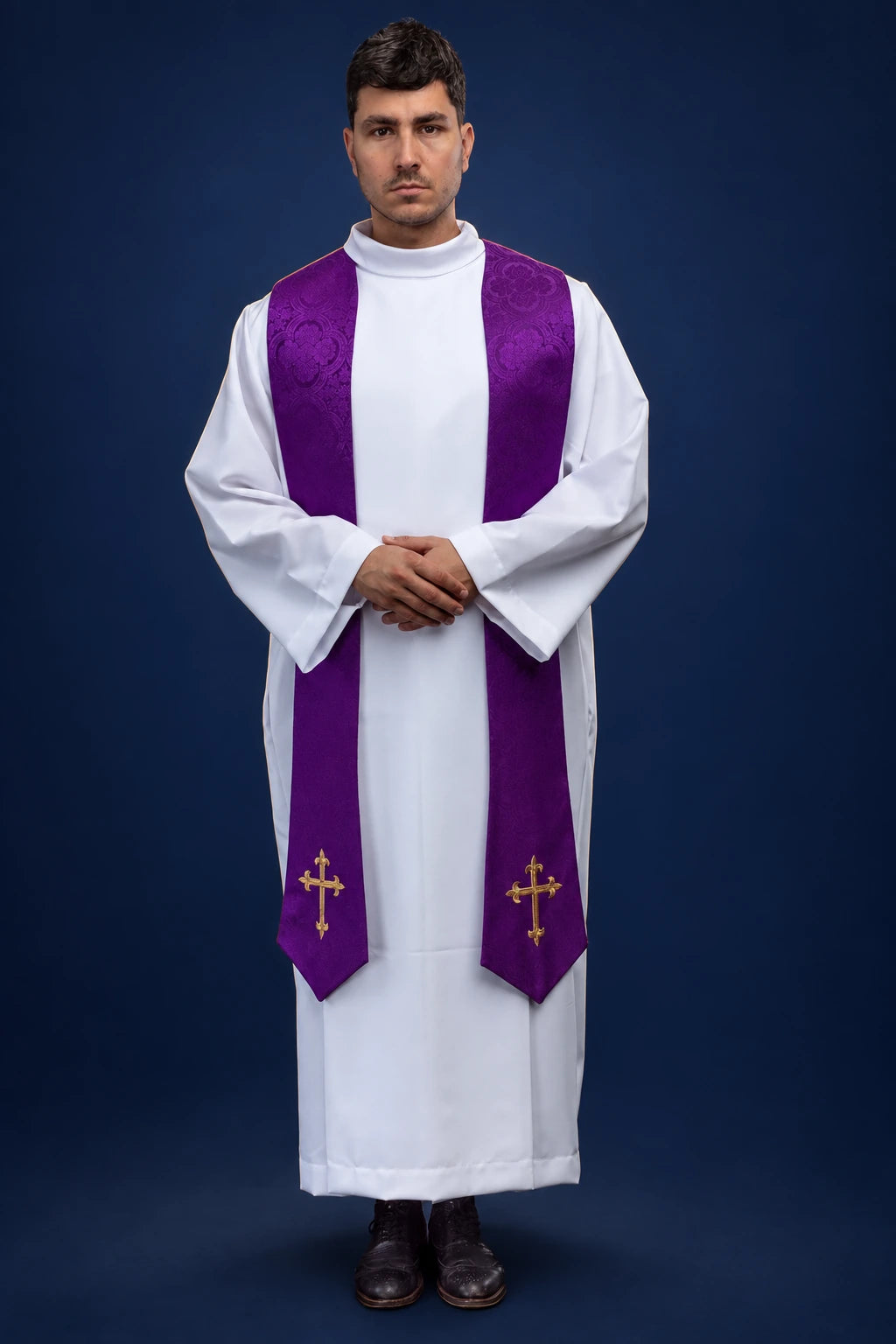 Embroidered Stole with a Cross Motif in Purple Jacquard Fabric, front view worn with gold crosses