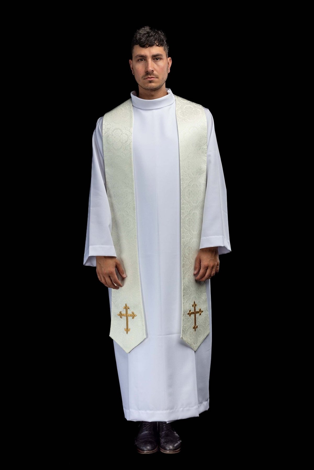 Ecru stole worn front view showing jacquard pattern and embroidered gold crosses