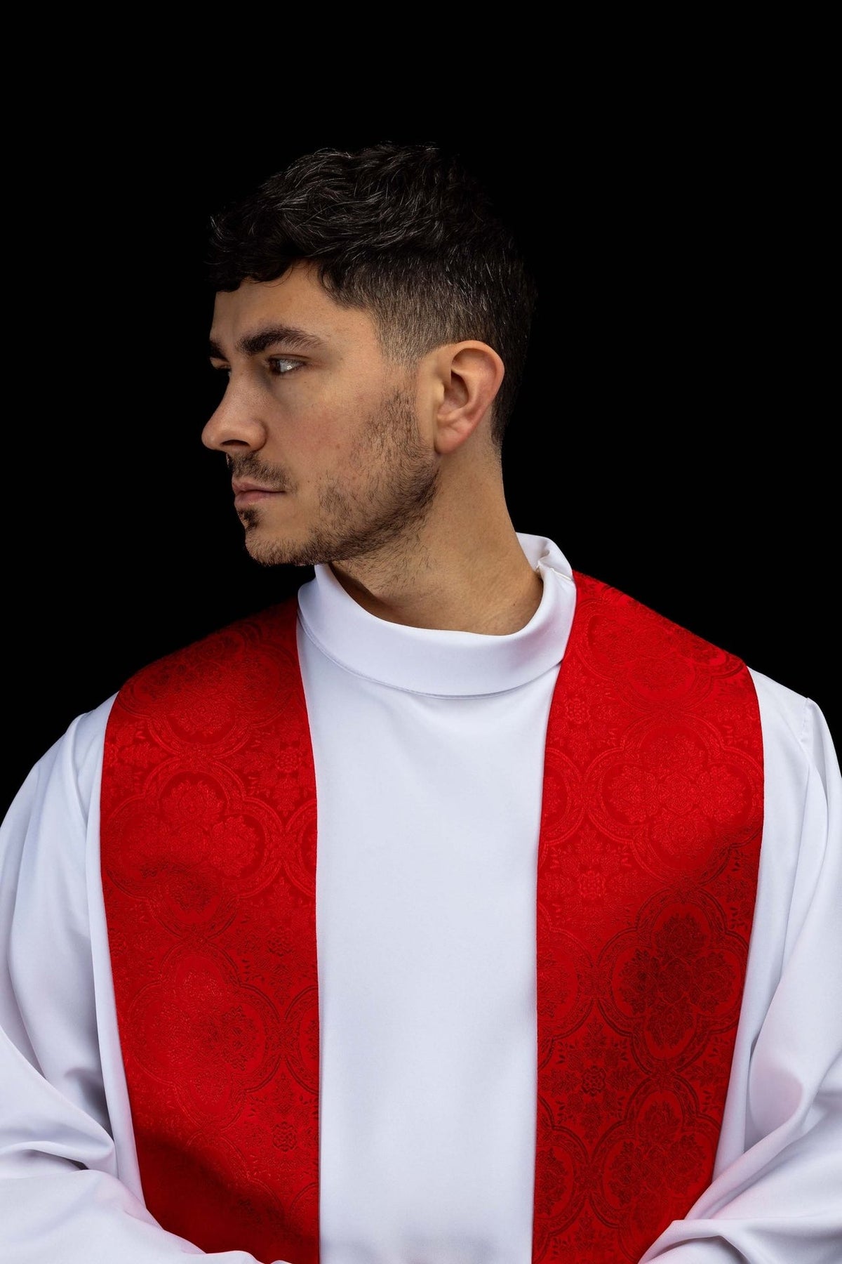 Red stole worn close-up showing jacquard pattern