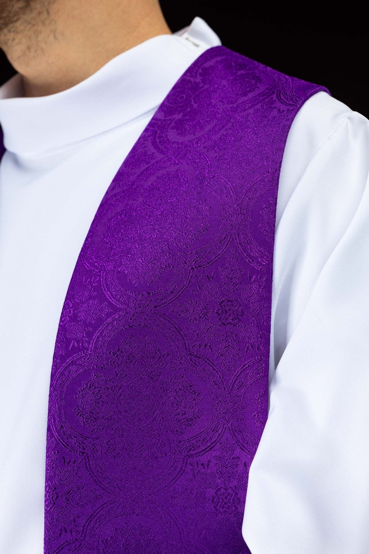 Purple stole side close-up showing floral jacquard fabric