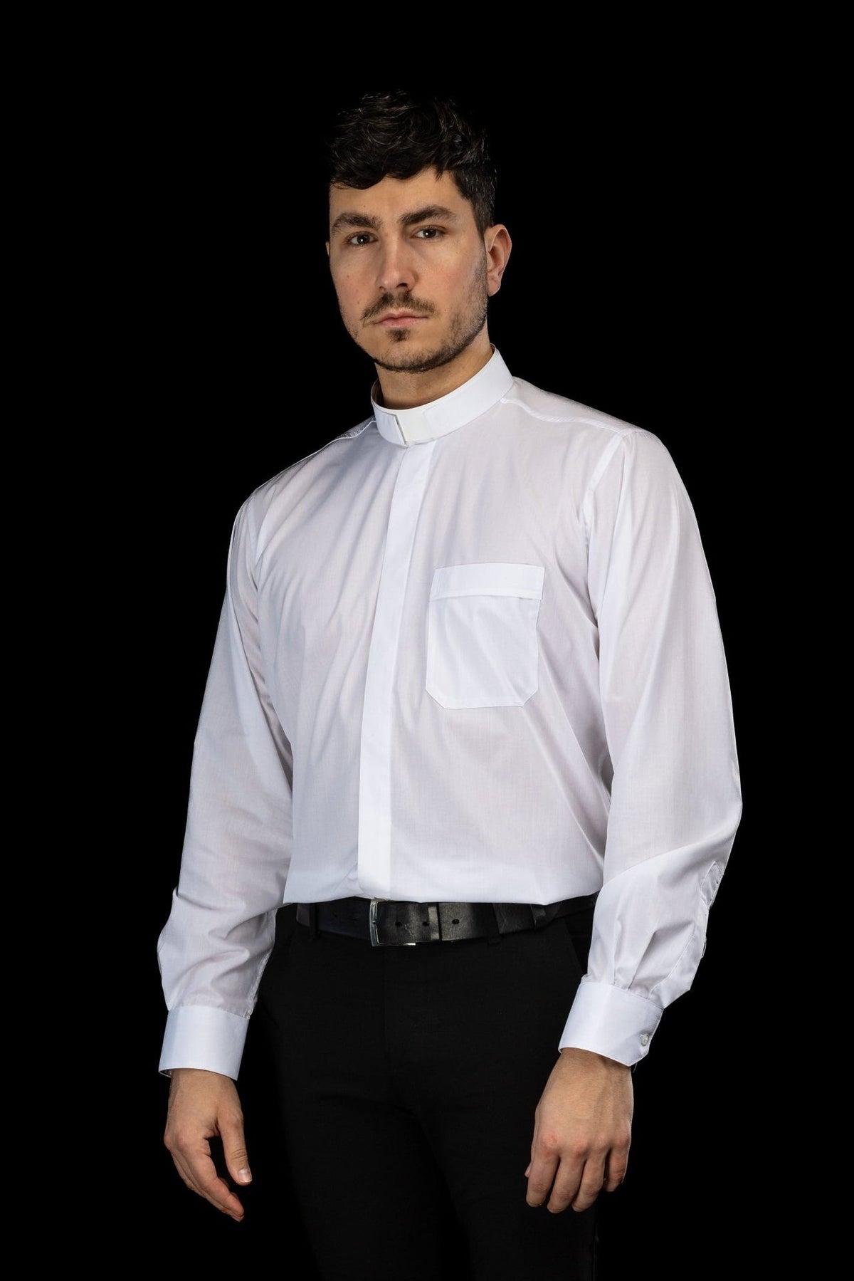 White clergy shirt angled view showing the chest pocket and long sleeves