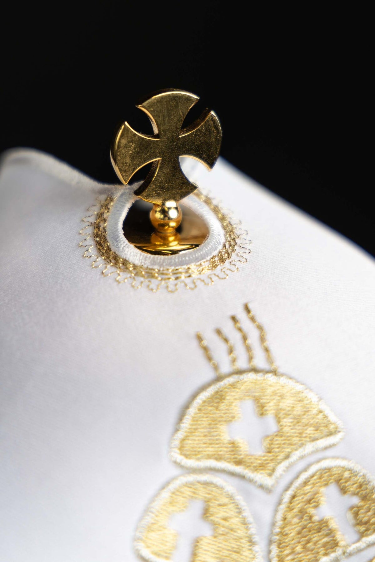 Ciborium veil close-up of gold cross-shaped finial and embroidery